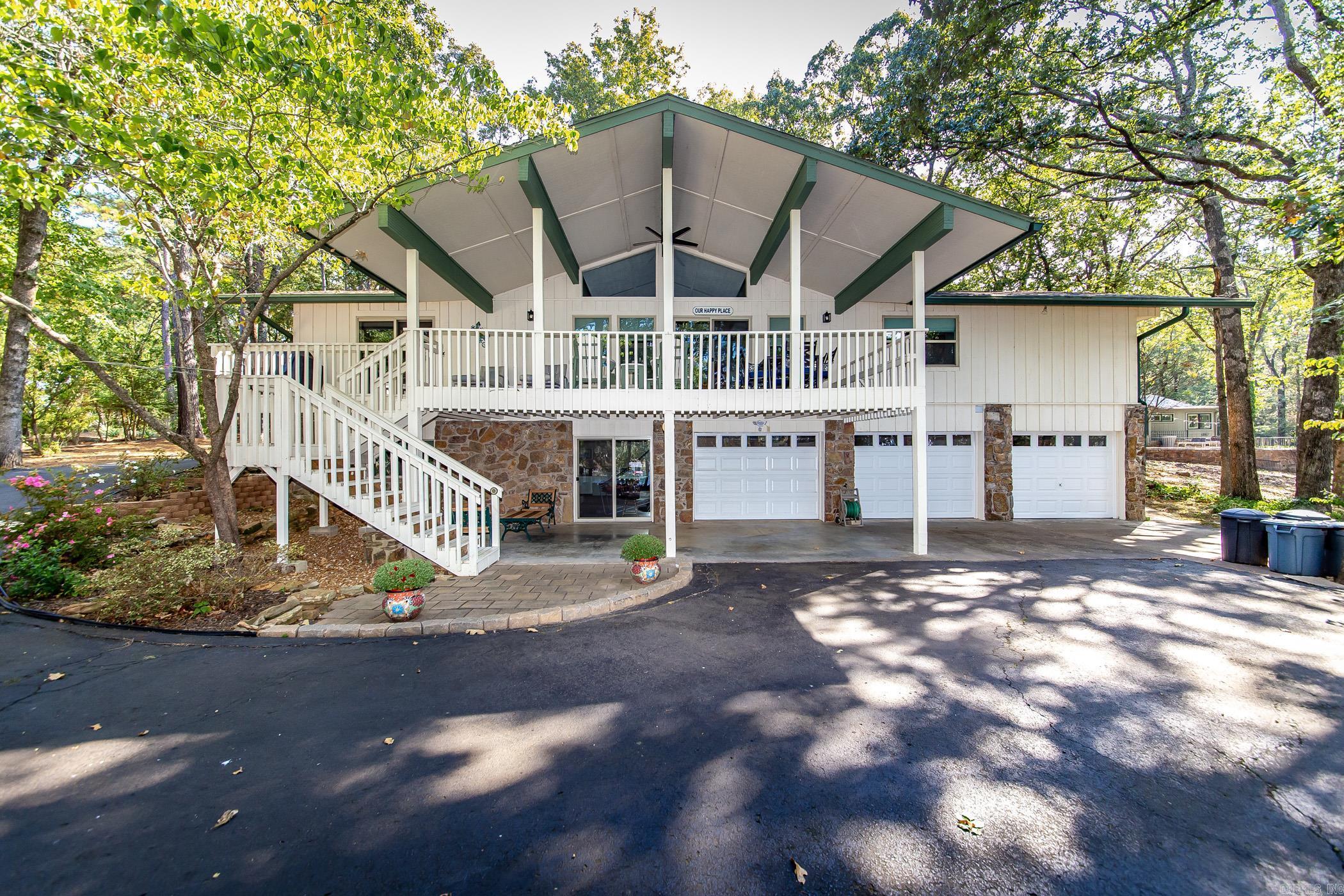 Wow ! What a beautiful lake front home on The Narrows. This home is like new. Completely remodeled from top to bottom. You have to see it to believe it. Nice view of Lacys Narrows Marina and Narrows bridge. Low white line with easy walk with steps to the water. Sits in a quiet neighborhood and nice subdivision. Home comes completely furnished. This lakefront home would be good for permanent resident, weekender, or a vacation rental. Property is already established as a VRBO rental. It doesn't get any better than this. This property wont last long so give us a call today!