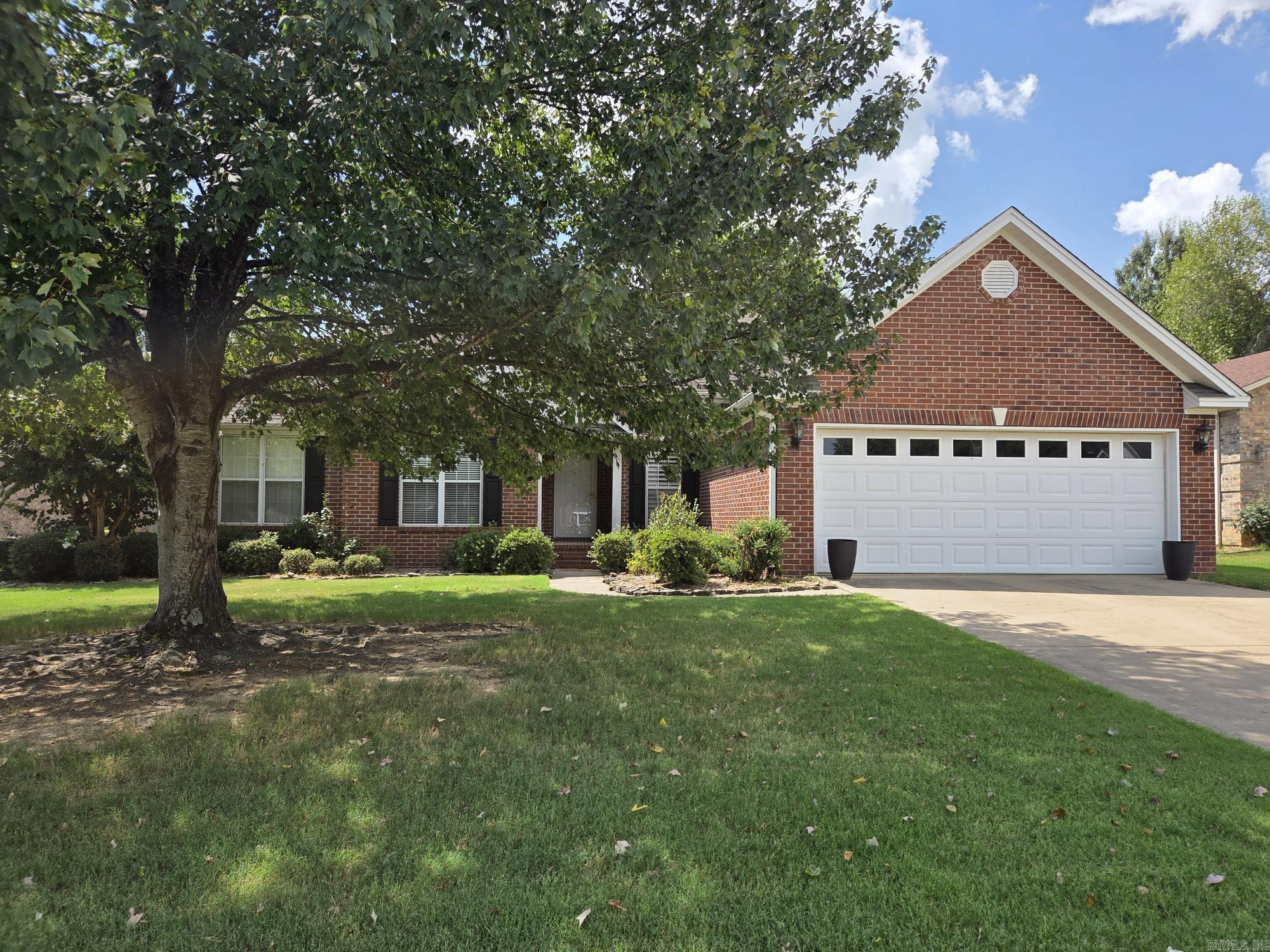 Nice 3 bedroom, 2.5 bath one level brick house with 2 car garage in great neighborhood. This house has a lot to offer with a gas log fireplace, tall ceilings, jacuzzi tub, standup shower with seat, walk in closet, built in desk in office that can also be used as 4th bedroom, gas water heater replaced in 2018, bay window, separate dining room, separate laundry, gutters, pantry, built in entertainment center in den, custom plantation blinds, extra landscaping, patio & extra concrete slab to build a shop or storage, wood privacy fenced in backyard. See agent remarks.