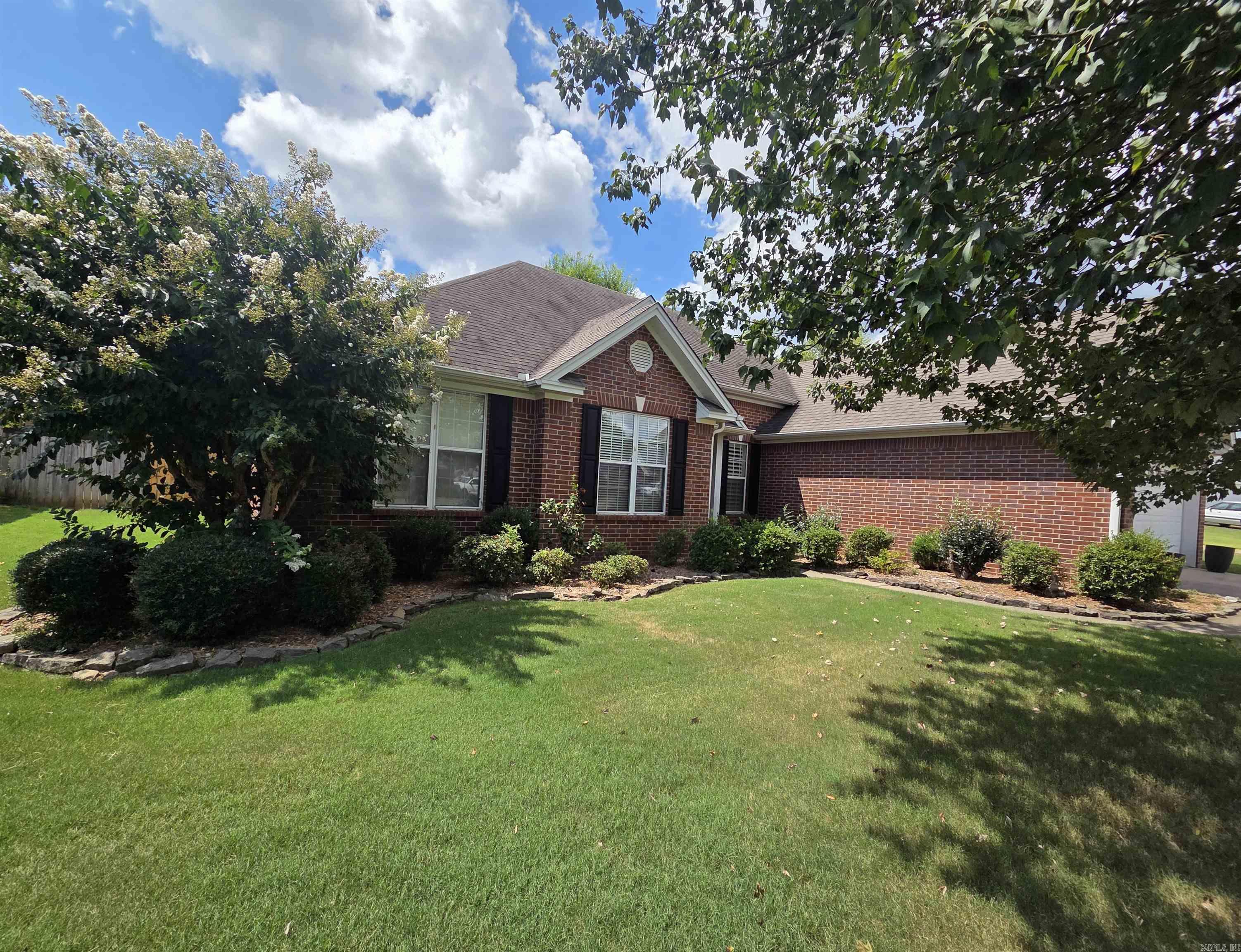Nice 3 bedroom, 2.5 bath one level brick house with 2 car garage in great neighborhood. This house has a lot to offer with a gas log fireplace, tall ceilings, jacuzzi tub, standup shower with seat, walk in closet, built in desk in office that can also be used as 4th bedroom, gas water heater replaced in 2018, bay window, separate dining room, separate laundry, gutters, pantry, built in entertainment center in den, custom plantation blinds, extra landscaping, patio & extra concrete slab to build a shop or storage, wood privacy fenced in backyard. See agent remarks.