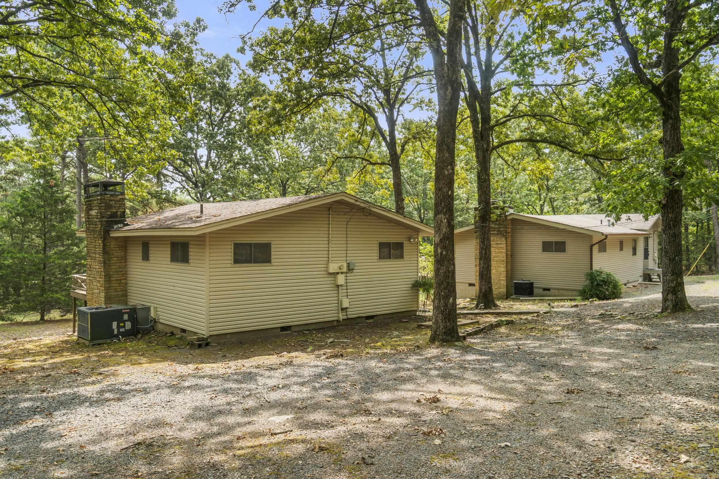 Secluded Lakefront Retreat ā 2.36 Acres on Beautiful Greers Ferry Lake Two charming cabins nestled on 2.36 private acres, just minutes from Heber Springs Marina. Perfect as vacation rentals or your own private getaway. One cottage offers 2 bedrooms and 2 baths, while the other features 2 bedrooms and 1 bath. Both have cozy wood-burning fireplaces for your enjoyment. Relax on the property and take in one of the best views of the 4th of July fireworks over the lake!