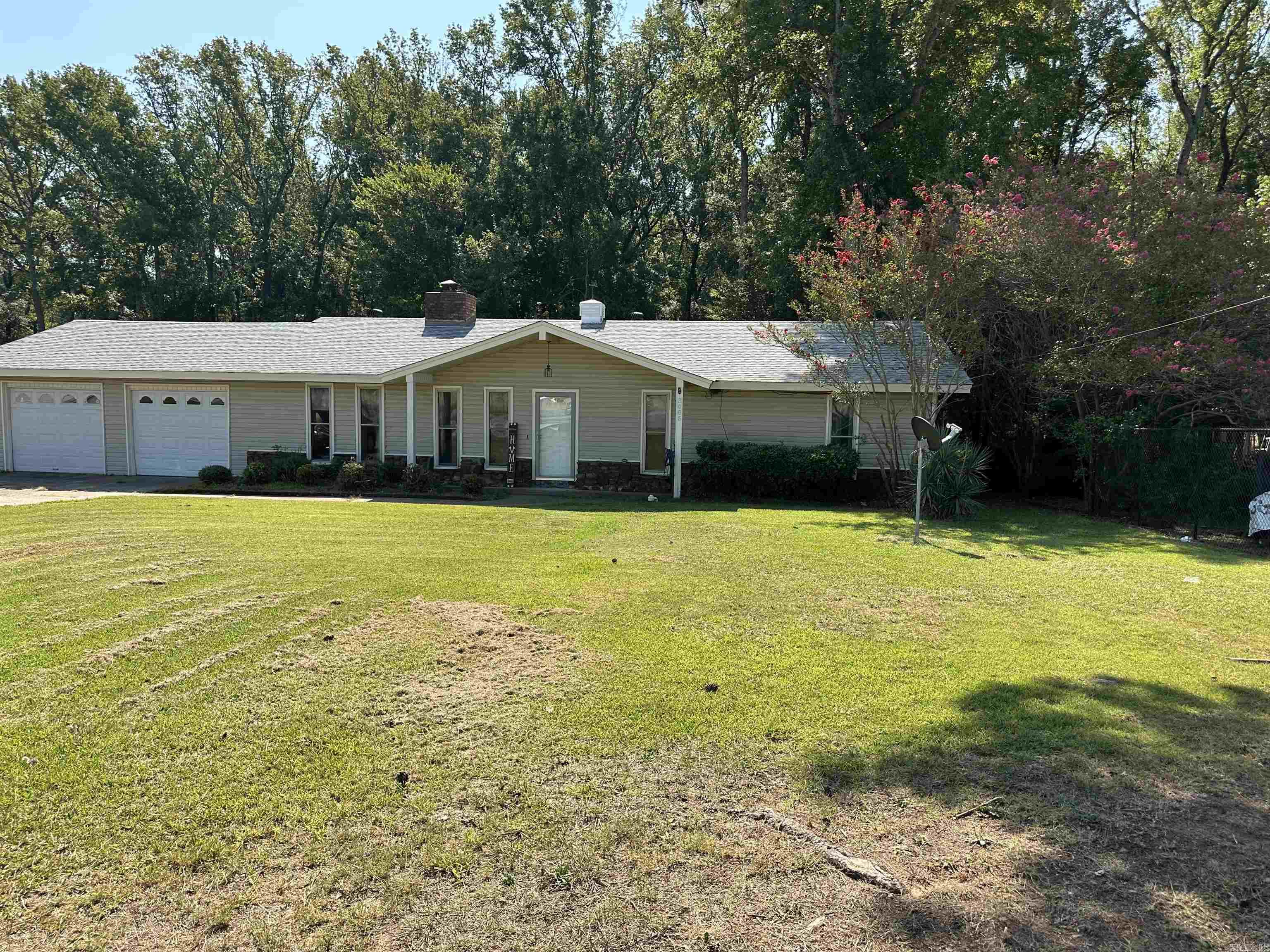 Well kept 3 bed 2 bath home on almost an acre of land, 2 car garage, fenced yard, screened in porch. Inside you have spacious primary, new flooring in kitchen and dinning room, wood fireplace and so much more. All appliances including washer and dryer convey.