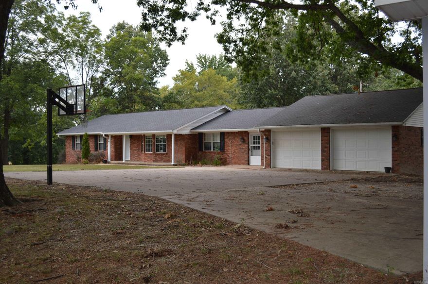 This 2,118 square foot home is sitting on 2.10 acres on top of scenic Crowley's Ridge between Piggott and Pollard, Arkansas. With four bedrooms and two and half bathrooms, sunroom off the kitchen and two car garage this home is for you and your growing family!  Need a shop? It comes with 2 of them. One is 20 x 24 with a concrete floor and electricity, the other 24 x 40 with electricity. All this and more on 2.10 ACRES.