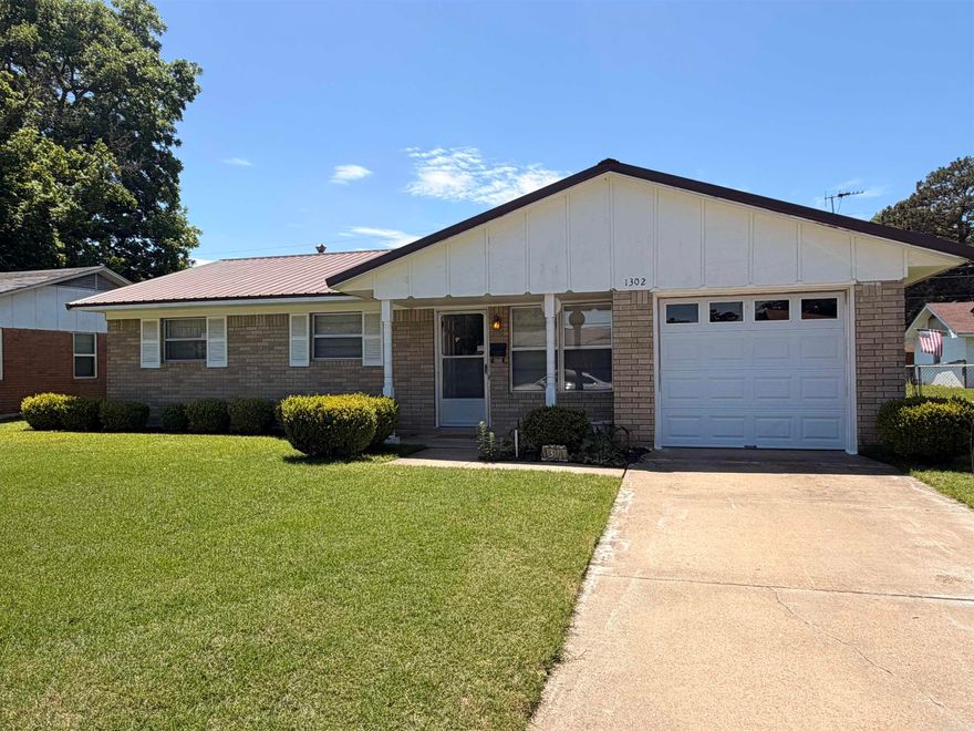 Charming one-level home located in the heart of Pine Bluff ! ! This 3-bedroom, 1.5-bathroom residence features a spacious living areas and a well kept  kitchen  Enjoy the charming  bathroom, a  separate laundry room, and a large fully fenced backyard with a separate storage building. —perfect for outdoor living.  Conveniently situated with easy access to the interstate and local shops, this home has it all! MOVE IN READY.