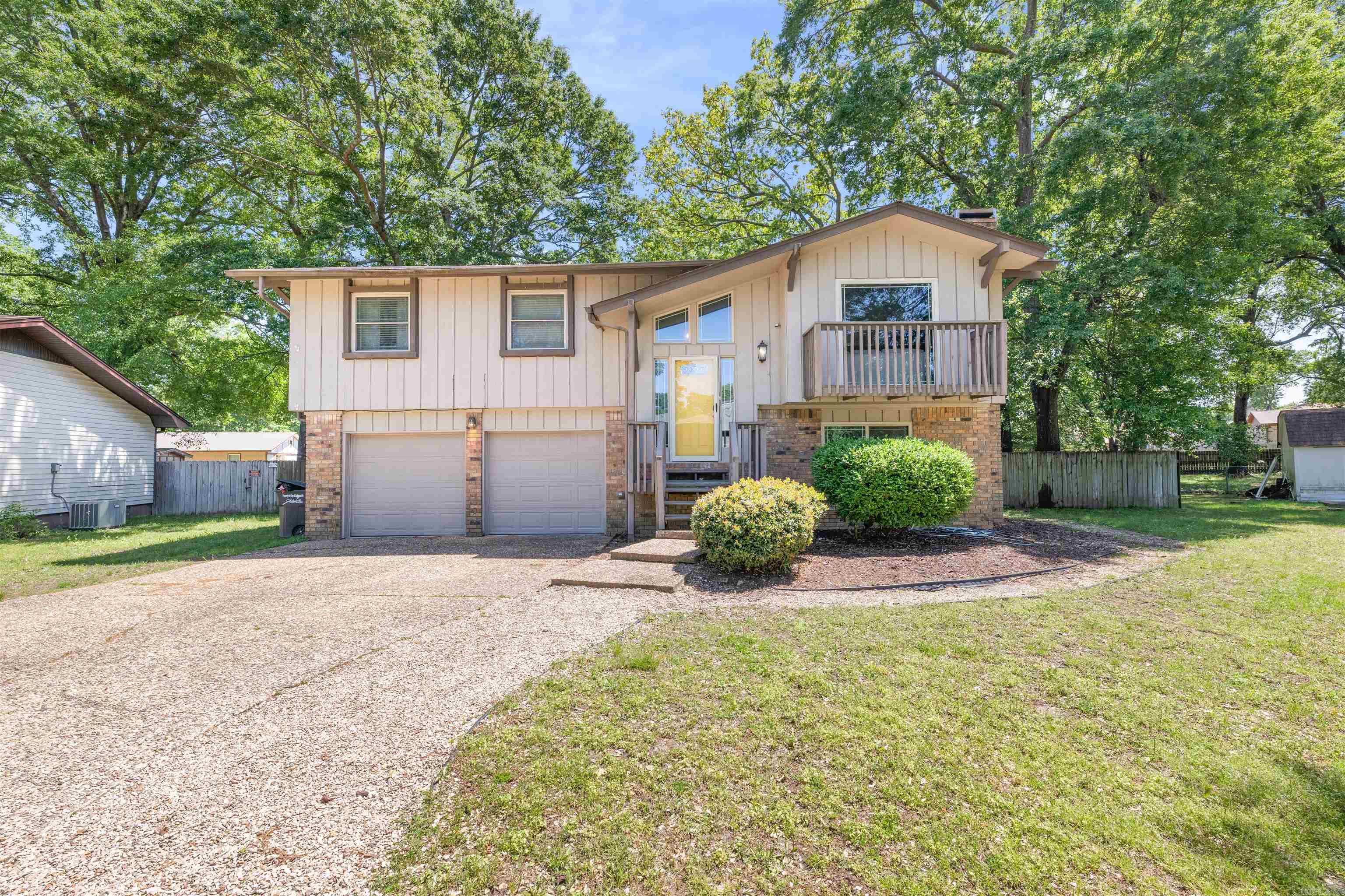 Tucked away in a quiet cul-de-sac in the heart of the Stonewall neighborhood, this charming 4-bedroom, 3-bath home offers more than just square footage — it’s a place where memories are made. Whether it's weekend movie nights by the fireplace in the great room or pancake breakfasts in the sunlit kitchen, this home is designed for the moments that matter. Upstairs, you'll find a spacious main living area with beautiful beamed ceilings and a flow that brings everyone together. The kitchen, with its warm tile countertops and breakfast bar, opens into the dining space perfect for sharing meals and stories after a long day. Downstairs is a true bonus a fourth bedroom, full bath, and a large flex space ideal for guests, a teen hangout, or even a second family room. Step outside and you'll discover a fully fenced backyard with room to play, garden, or simply relax on the deck while the kids and pets roam free. Located on over a quarter acre, just minutes from schools, parks, and everything Jacksonville has to offer, 102 Oxford Cove isn’t just a house it’s a home with heart. If you're looking for space, warmth, and a place where your family can grow. Property does require flood insurance.