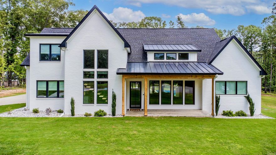 Custom built in 2023 on 1 acre in the desirable Hazel Oak subdivision! Stunning 5 bed, 3 bath home is packed with luxury features & built for entertaining. 18X36 in-ground saltwater pool with color-changing LED lights, deck ledge, & an outdoor kitchen under a large covered patio. Oversized 3 car garage! Open floor plan show-stopper with vaulted 20-ft ceilings, white oak hardwoods, & floating stairs with steel stringers. The dream kitchen includes ZLINE Commercial Appliances, gas range with double ovens, microwave drawer, massive 7.5 x 10-ft island with bar seating, soapstone counters, a huge walk-in pantry, breakfast nook & coffee bar. The main floor features the spacious primary suite with a soaking tub, oversized walk-in shower, double vanities, & a custom walk-in closet with dresser island. A 2nd bedroom with Murphy bed & a full guest bath are on the main level. Upstairs offers 3 additional bedrooms with walk-in closets, a 2nd living area, & full bath with a vanity, makeup area, & walk-in shower. Laundry with laundry chute, folding station, sink & storage. Mudroom with drop zone off the garage with epoxy floors, framed stairs to attic & pool supply room. Only 5 miles to I-30!