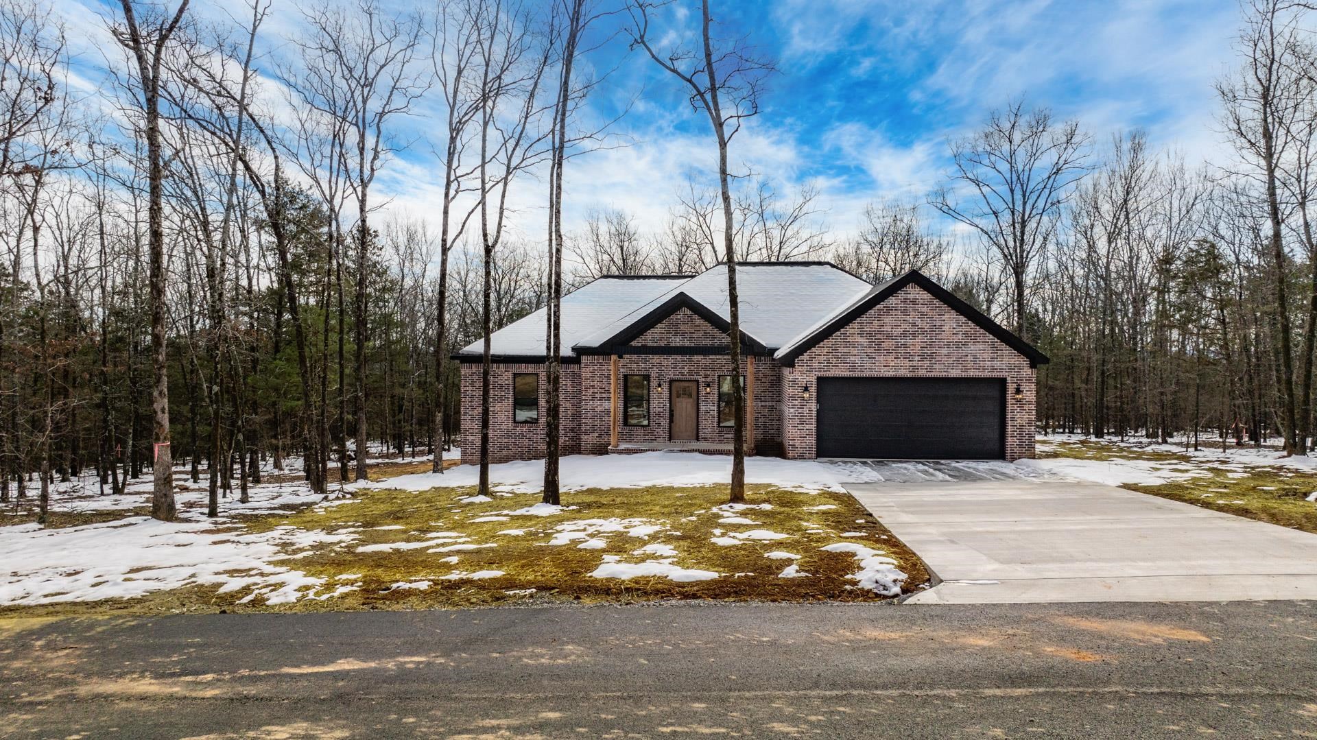 New Construction on 1.08 acres! This lot is mostly wooded with a private backyard. Dead end street with little traffic. Luxury vinyl flooring throughout. Kitchen has cabinets to the celing for extra storage. Large corner pantry. Primary bathroom has a nice walk in tiled shower. Guest bathroom is large with 2 sinks. Covered back porch/patio. Option to purchase additional land beside the home.