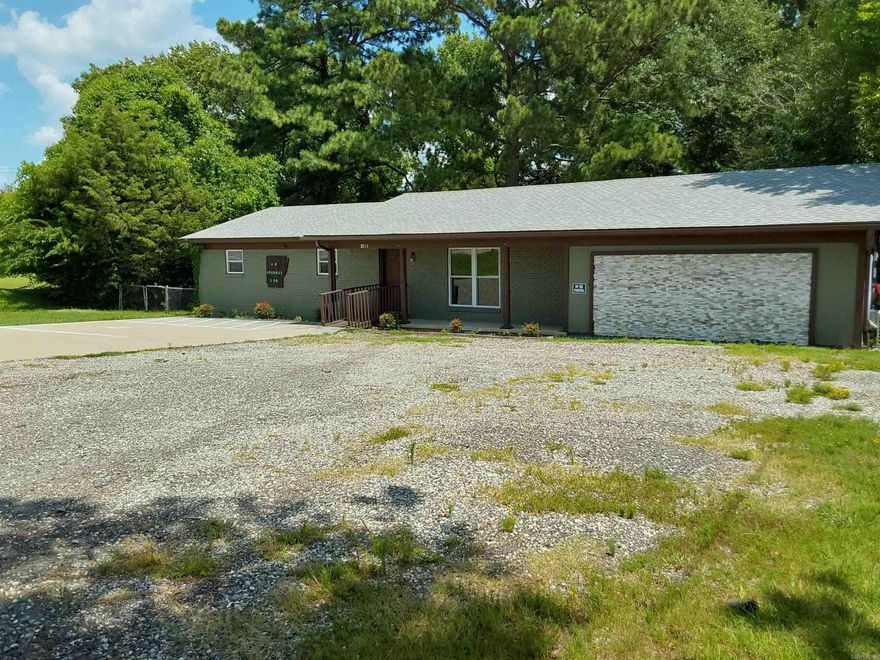 Prime Opportunity on Military Road! Zoned C-2 Commercial, this beautifully remodeled property offers the perfect setup for a business. Located just off I-30 with high traffic visibility, it's ideal for almost any type of business. The property has been fully updated with new bathrooms, stylish laminate flooring, fresh paint, energy-efficient low-e windows, updated lighting and fans, and modern plumbing fixtures. Major upgrades include a brand new roof (2024) and two new 2.5-ton HVAC units—all ready for your business launch. Don’t miss this unique investment opportunity! Agents see remarks.