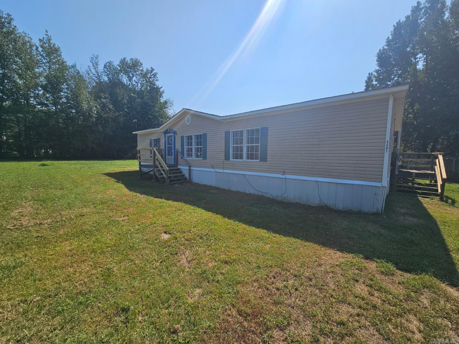 Welcome to 5401 Bayou Meto Loop. This home is a 3-bed 2-bath home on a half-acre lot. This home is conveniently located between Cabot, Jacksonville, and North Little Rock. The monthly rent is $1,200, and the deposit is $1,200. Call today to set up your private showing