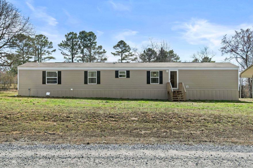 Welcome to peaceful country living! This 2024 single wide home offers 3 bedrooms, 2 full baths, and a flex room that can be utilized as an office or separate dining room. Situated on 3.14 acres in a quiet rural setting, you'll enjoy space, serenity, and room to grow. Perfect opportunity for a first-time home buyer or anyone looking to downsize without sacrificing comfort. Best of all - this home is being sold Furnished, making it truly move-in ready! Just bring your clothes and settle right in! This mobile is on a permanent foundation. Call today for more information and to schedule your private showing.