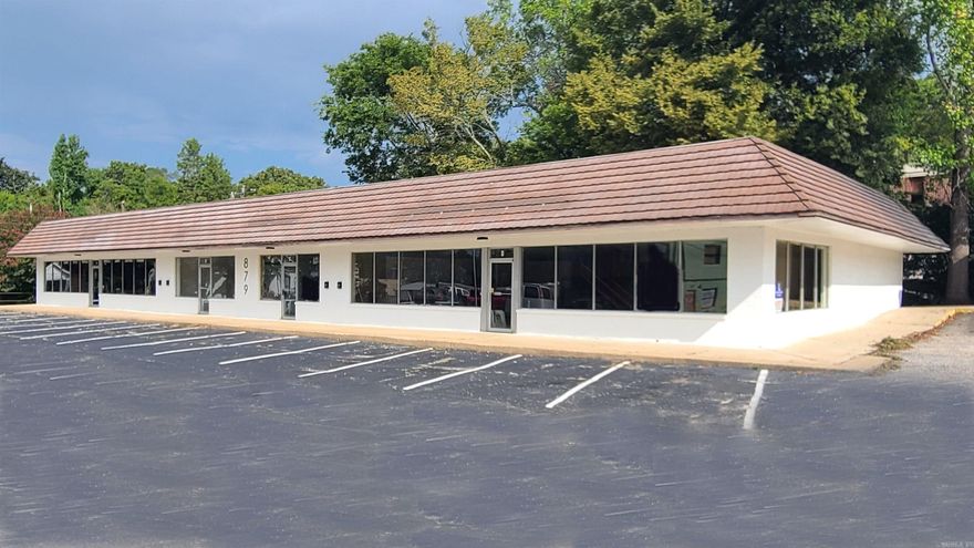 Small retail Center with four (4) Tenant spaces available. 2 - 2,500 sf spaces and 1 - 1,075 sf space and 1 - 875 ft space.  Each space will require Tenant improvements, Landlord is open to terms and finish out offers. Near downtown, short distance to Backwoods Trail system.