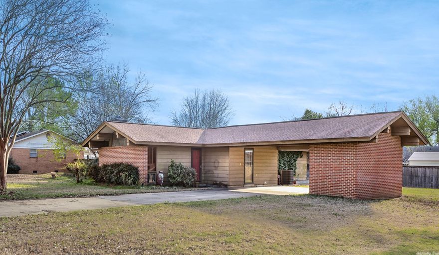 Tons of curb appeal in an excellent location! This contemporary gem has so much character and potential! Stunning ceilings and beams throughout. This versatile floor plan features a great room upon entry and additional living space/hearth room off kitchen. Open kitchen/dining/hearth area has excess windows, bathing the area in natural light. Spacious master suite with tiled walk-in shower. Very large, level, fully-fenced yard.