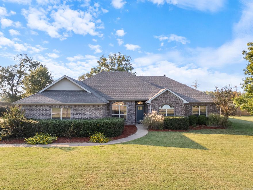 Stunning One-Level Home in Ashley Downs. This  one-owner, residence boasts 4 spacious bedrooms and 2.5 baths, offering ample space for comfort and relaxation—all on one level. Priced $10,000 below any comparable homes in the area, this is a rare find! Key Features: Brand new roof (May 2024) and ew culvert/driveway (Sept 2024) for peace of mind. Beautifully remodeled kitchen, perfect for the home chef, featuring a gas range and stylish finishes. Enjoy your own slice of paradise with mature pecan, oak, maple, red bud, and river birch trees, plus producing pear, plum, and peach trees. Blackberries and wild grapes grow down by the lake. Hardwood floors with a 50-year warranty—durable and stunning! Pecan wood blinds in every room add warmth and character. An underground pet fence ensures your furry friends have a safe space to roam. 5G fiber throughout the neighborhood. This home truly blends comfort and nature, making it perfect for families and entertaining. Don't miss out on this incredible opportunity—schedule your tour today and discover why this home is the ideal place to create lasting memories!