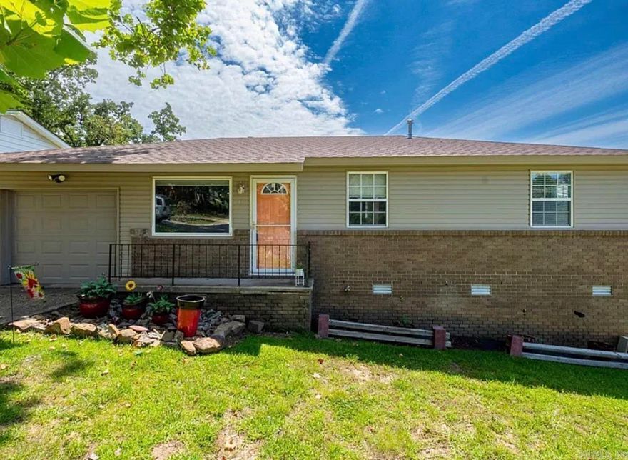 Cute 3 bed 1 bath, updated with beautiful hardwoods!  Fully fenced in backyard! Come see it!