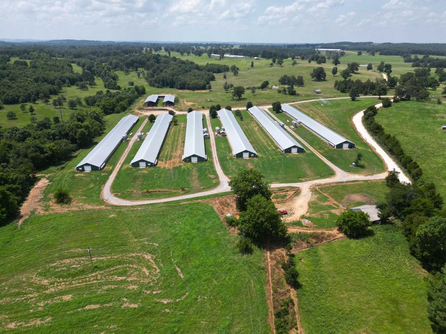 Beautiful Opportunity Available in North Arkansas! Lucrative, high income producing Poultry Farm sitting on 32 acres +/- , bordering a picturesque spring fed creek, has 6 broiler houses 43 x 450 ea, 2 stacking sheds 40 x 150 ea, a well house with new pump and 3 water tanks, city water, new compost facility, hay field AND a tiny house all fenced and cross fenced allowing for additional homesteading and animals.  This farm boasts impressive technology including the AGRI Alert System. The houses are completely updated and equipped with a computerized control system that operates ventilation, climate, feeding and watering which can even be monitored remotely! Two generators will operate the facility in the event of power outage.  Houses were built 2006 and fully updated 2020. Stack Sheds built 2017. PECO contract currently. Ask about financing!