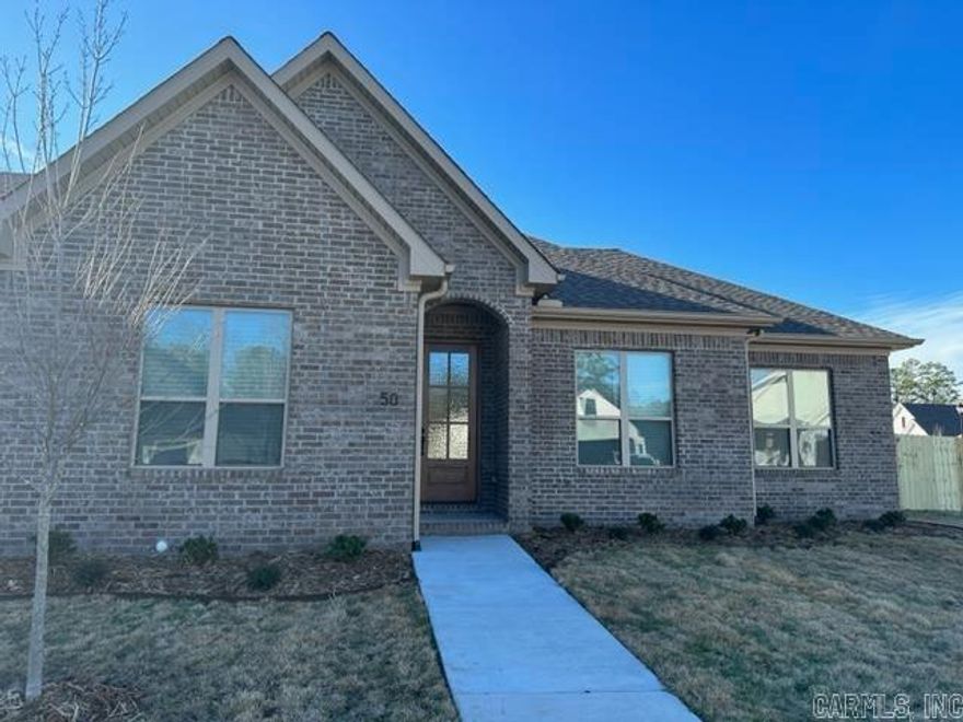 Looking for low maintenance? Never mow again in Parkside at Wildwood! This attached home by Randy James Construction features designer curated finishes throughout & boasts a WLR location that is in close proximity to all of your favorite shopping & dining options. 50 Saffron Circle offers a functional layout with 3 bedrooms, 2 bathrooms, a chef's kitchen with custom cabinetry, quartz counters, and a cozy gas fireplace. Enjoy a private back porch area as well as a two-car garage! This home features a spacious side yard that is larger than most yards you will find in the area! Estimated completion of early November.