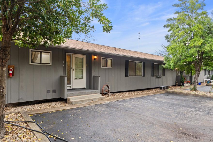 Enjoy peaceful Ozark hill views and easy lake living in this beautifully updated 2-bedroom condo just minutes from Bull Shoals Lake and the marina. This spacious condo lives like a one-story home with all necessities on the main level. Experience the fully remodeled kitchen with all new appliances, soft brand-new carpet, and beautifully remodeled bathrooms with thousands invested in upgrades. The home also features a (boat-sized) garage plus a downstairs den with additional outside entry, perfect for a hobby room, guest space, or home office. Located in the charming lake town of Bull Shoals near boating, fishing, and everyday conveniences. Capitalize on this move-in-ready condo in a 45+ community (with board-approved exceptions possible) and start living your best lake life today!