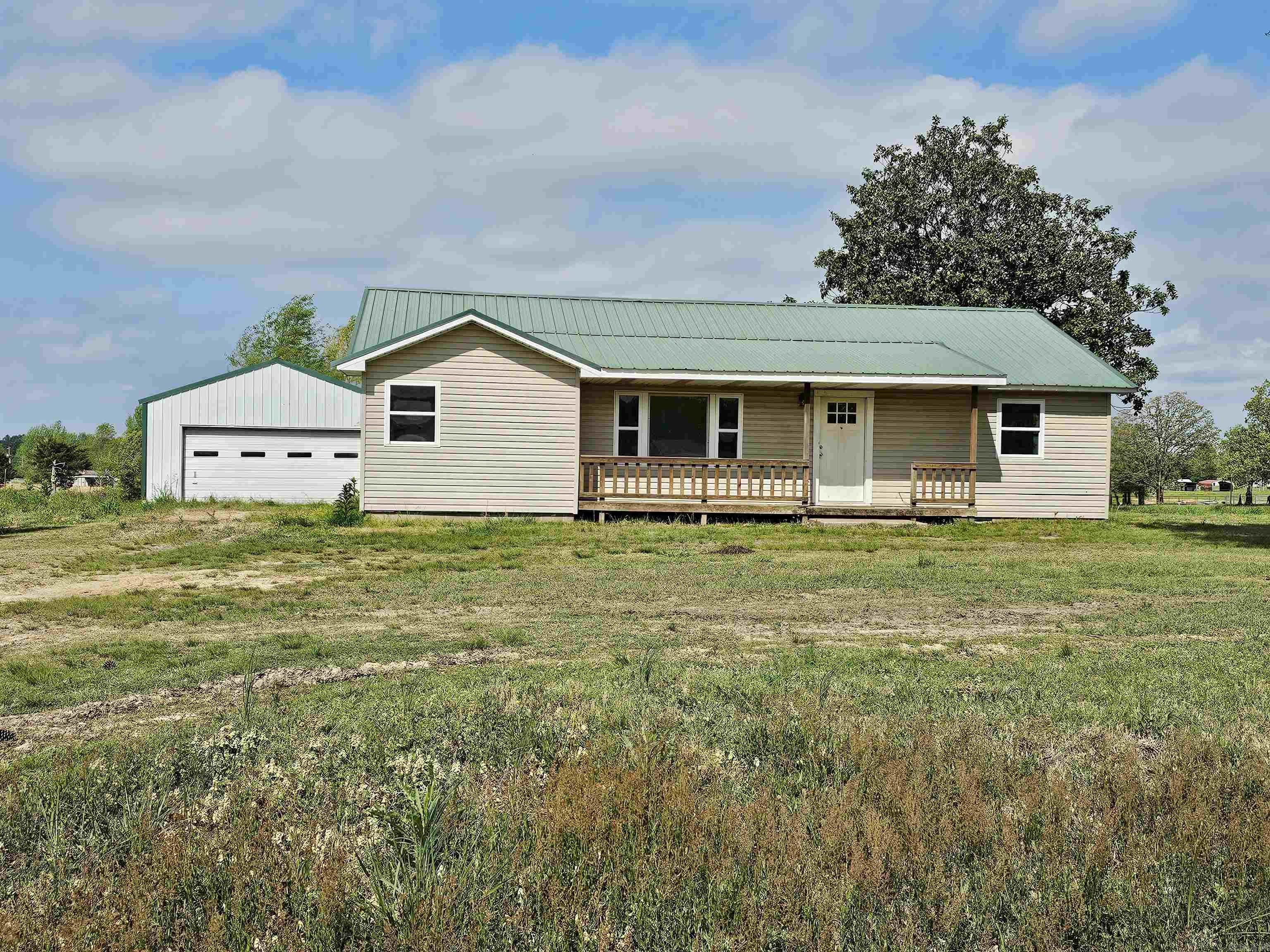 Come check out this cute country home just outside of Guy. Located on approximately an acre, 3 bedrooms and 1 bathroom with a large shop. AGENTS SEE REMARKS.