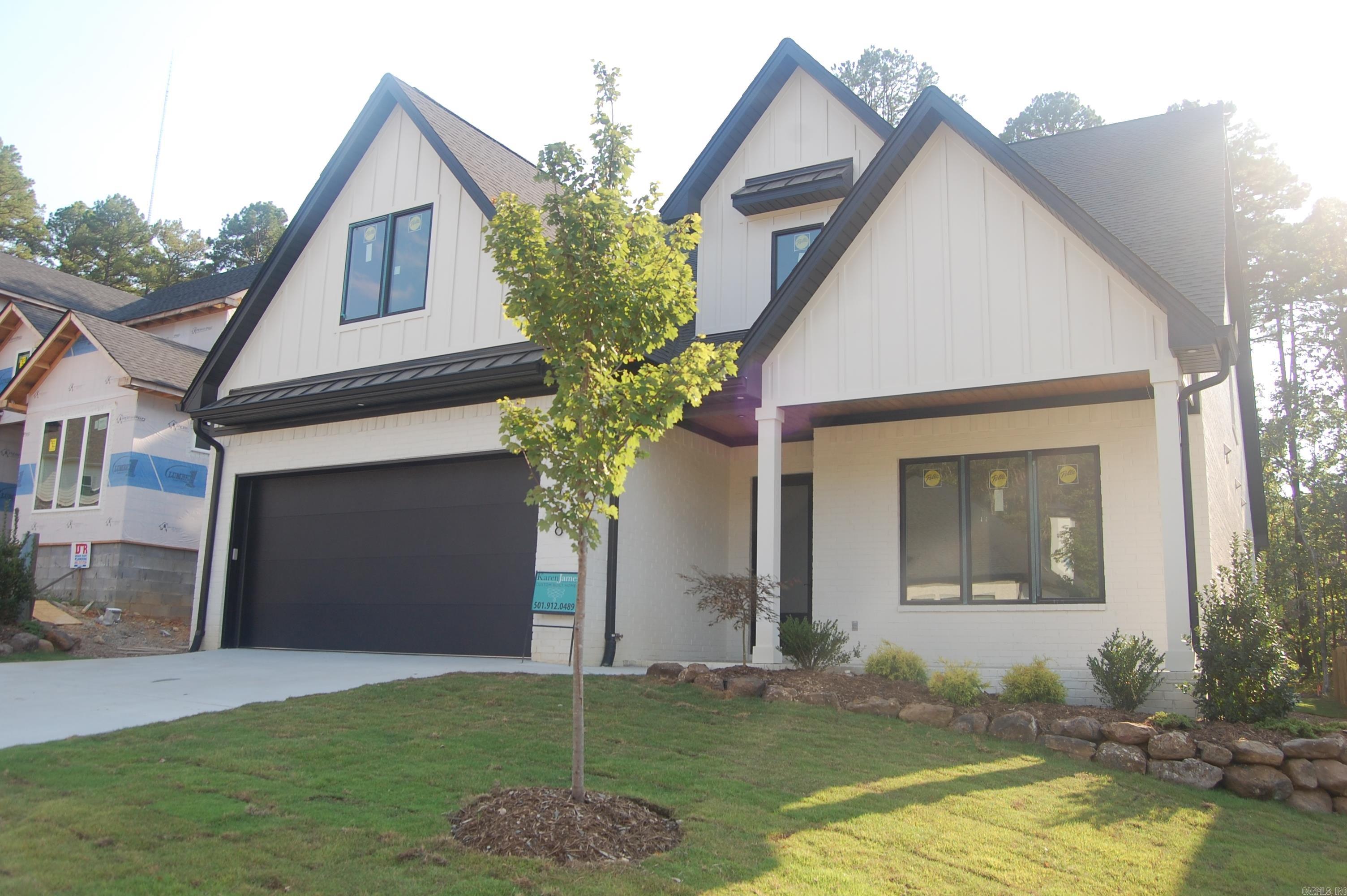 Beautiful New Construction! 5 bedrooms, 5 bath home in the lovely Calion Court Subdivision in Chenal Valley. Primary bedroom & Guest bedroom on main level, 3 bedrooms with private baths upstairs with a large loft room. Quartz countertops in all baths, laundry & kitchen. Gorgeous White Oak hardwoods. Beautiful tile in all bathrooms & laundry...Energy efficient heating & air, Tankless water system, Pella Windows, Sprinkler system, and security system