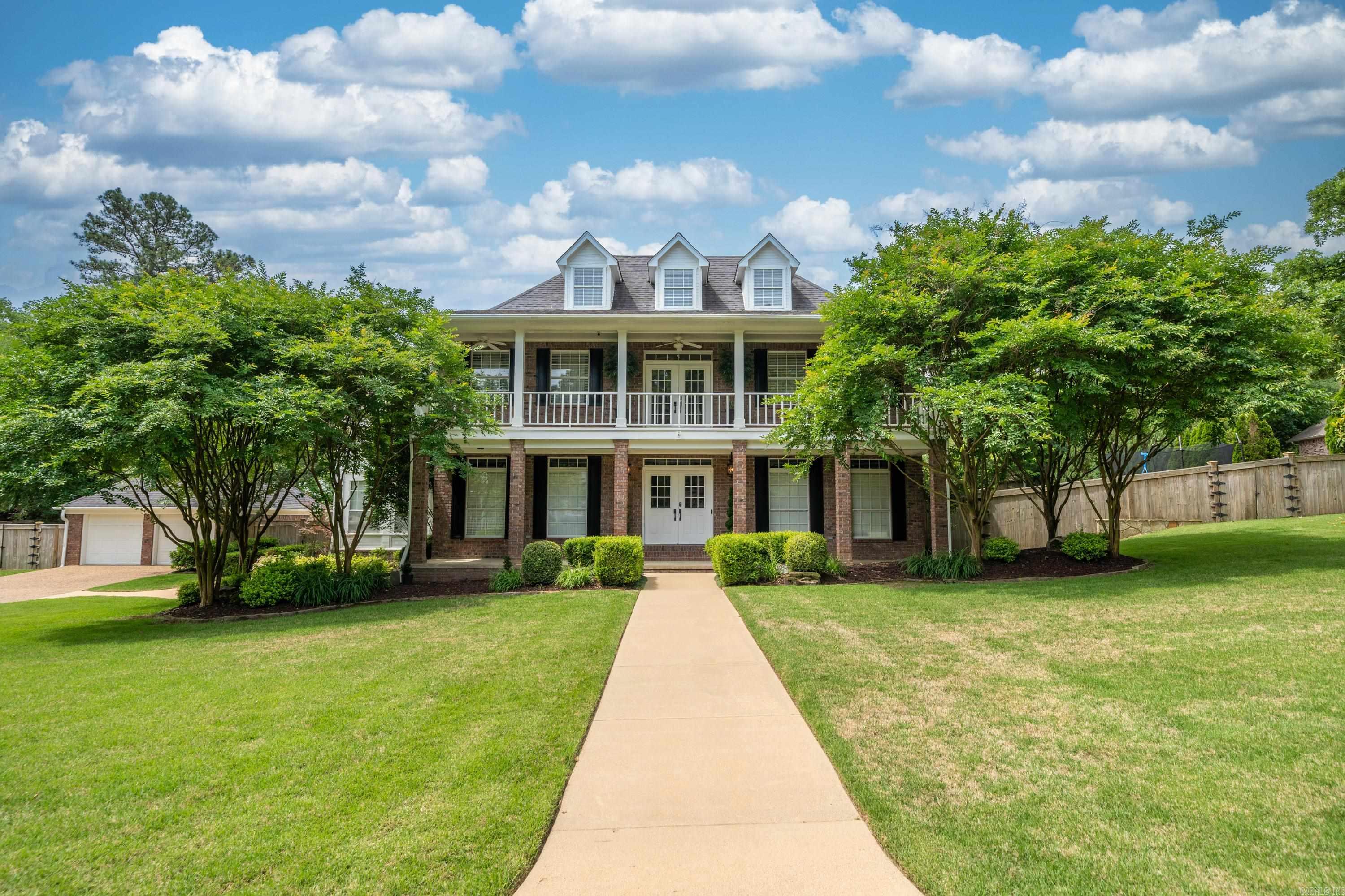 Nestled within the prestigious Eastgate 2 subdivision, this iconic home presents an unparalleled opportunity for luxury living. Boasting five bedrooms and three-and-a-half baths, this residence epitomizes elegance and comfort. As you approach, the property's captivating curb appeal beckons, with meticulously maintained landscaping framing the grand entrance. Stepping inside, you're greeted by an atmosphere of sophistication and warmth, where every detail has been carefully curated to perfection. The heart of the home lies in its expansive living spaces, designed for both relaxation and entertainment. The gourmet kitchen is a chef's delight, equipped with top-of-the-line appliances and an oversized island, while the adjacent dining area offers a seamless flow for hosting gatherings of any size. The main level features a palatial primary en-suite, providing a serene retreat complete with lavish amenities and ample natural light. Upstairs, additional bedrooms offer privacy and comfort for family members or guests, each thoughtfully appointed with generous closet space and luxurious finishes.