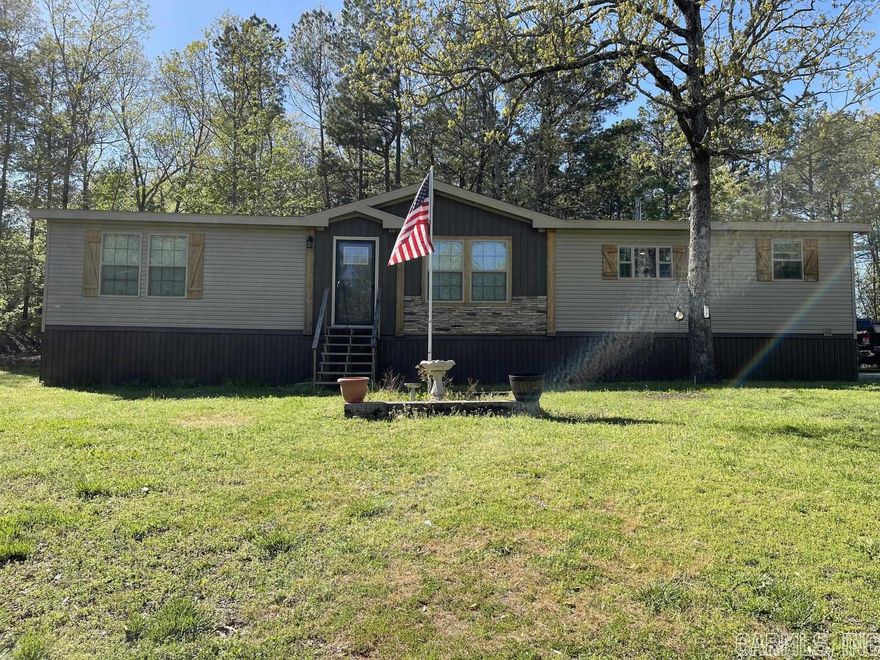 Secluded with no restrictions this 3 bedroom 2 bath, 2019 Platinum edition Manufactured home has high grade finishes. Home features open floor plan with master suite on separate end from the rest of the bedrooms, and dedicated laundry. The large open kitchen features a large island with lots of storage and electric. The land has a chicken coop and plenty of room for a fenced area for your fur babies, and a large garden spot. This is a must see to appreciate it!!