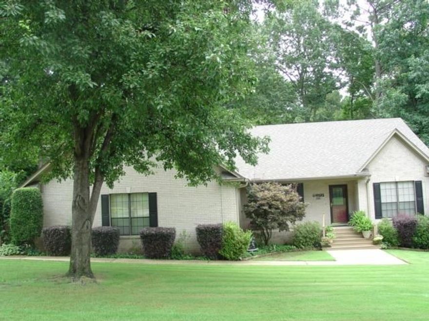 All brick, one story home with a well designed floor plan  has formal DR and a   breakfast area with bay window.  Separate BR plan with master BR features new H/W flooring, a private deck with privacy fencing. the MBath has his/her closets on either side of the whirlpool and separate shower.  The large great room has h/w floors, pretty WBFP with glass doors & screen. The well equipped kitchen is centrally located.   Enjoy the private wooded back from a large screened porch + deck.  See agent remarks.