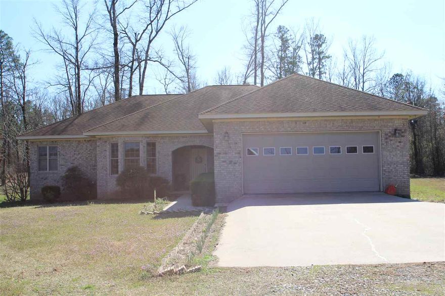 If you'd like to live near Harris Brake Lake but aren't thrilled about the close proximity of the neighbors on the waterfront properties, check this out!  Take a quick ride in your car or ATV to the public boat ramp & you're set for a day of fishing!  This well-maintained property has 3 beds/2 baths plus office, 2119 sf on 6.8 acres, providing you with privacy & plenty of space.  [AGENTS SEE REMARKS]