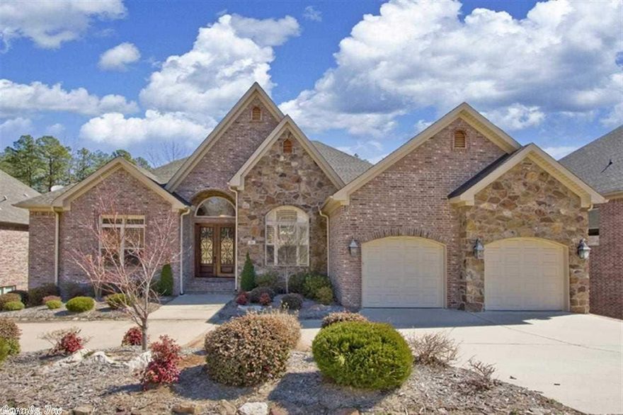 Lives like a 1 level - fabulous open floor plan, soaring ceilings, heavy crown moldings, beautiful hardwood floors, lots of natural light, gourmet kitchen.  Luxurious master on main level with huge closet and wonderful bath. Study/bedroom on main level with private bath.  2 add. bedrooms on main level with jack n jill bath.  Upstairs is wonderful space for another bedroom and/or gameroom with lge closet and full bath and plumbed for kitchenette.  Large deck overlooking greenbelt and 2nd covered deck.