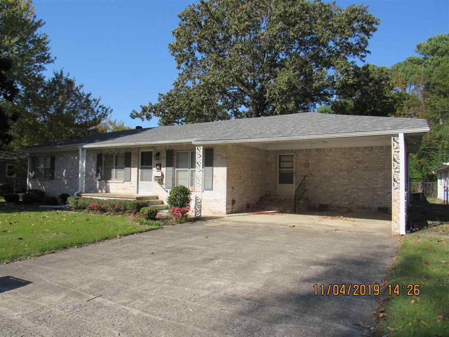 Well maintained older home close to UCA, well maintained floors, 2 living areas, updated hall bath, new appliances, separate laundry room with hook-ups, custom faux wood blinds, chain-link fenced yard, 2 car carport, detached storage building. Lawn Care included. No pets.