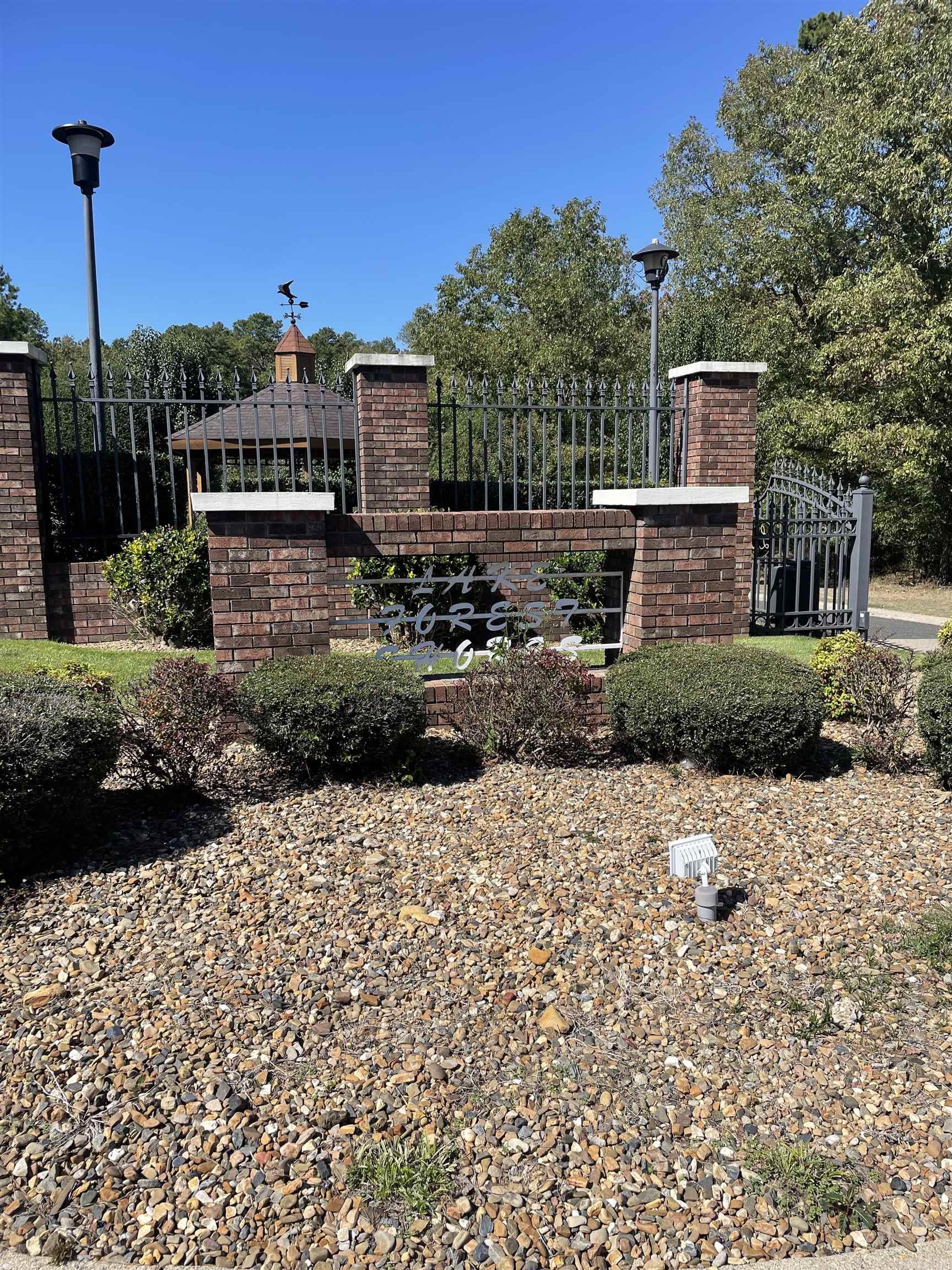 Investors and Builders- What a great area to build, beautiful on lake and off lake properties in Lake Hamilton district Neighborhood. This Lot 7 offers privacy, lake views, lake access boat ramp across the street, sewer and electric utilities at the street. Gated entrance but no POA or restrictions!