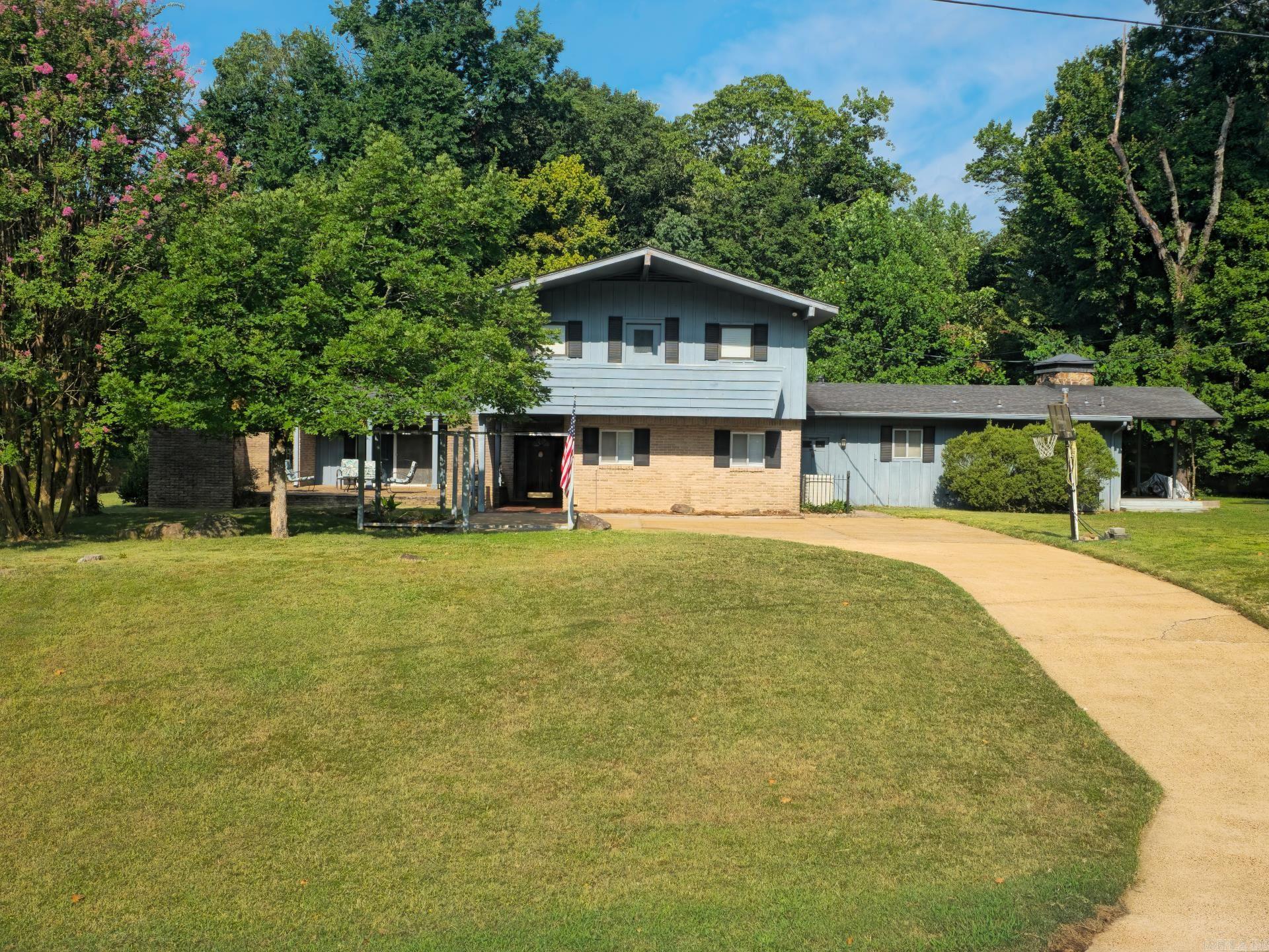 Spacious and beautifully maintained 4 bed, 4 bath home in Helena, AR! This two-story gem offers two abundant living spaces, perfect for comfortable everyday living and entertaining. Enjoy the expansive outdoor living area, ideal for relaxing or hosting guests. Inside, you'll find a generous living area equipped with a wet bar, an updated kitchen, and ample natural light throughout. There are two "primary" bedrooms, one on the ground floor and one upstairs as well! Recent upgrades include two brand new HVAC units and a tankless water heater for energy efficiency and year-round comfort. The concrete driveway adds convenience and curb appeal. Donāt miss this incredible opportunityāschedule your private showing today!