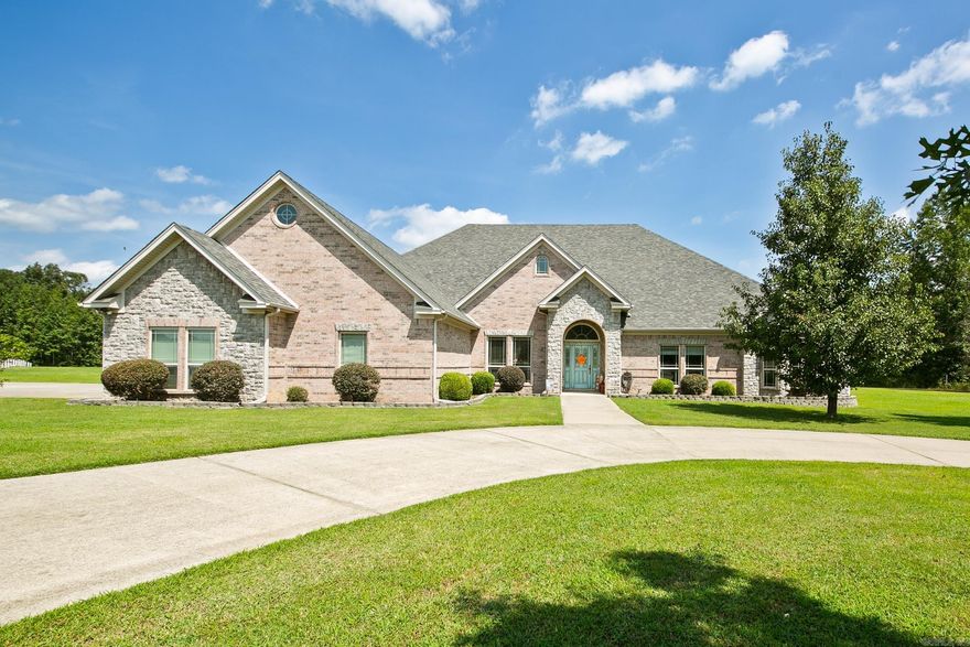 Welcome to this beautiful 4-bedroom, 4.5-bath home on 3 acres in an exclusive neighborhood. New HVAC and Roof! A circle drive leads to a home designed for family living and entertaining, featuring hardwood floors, maple cabinets, a spacious kitchen, formal dining, and a private office. The master suite includes a huge closet, jetted tub, and separate shower, while every bedroom has its own bath and plenty of storage. Enjoy gatherings on the massive covered porch, take a dip in the inground pool, or host movie nights in the heated and cooled 3-car garage, with one bay converted into a media room. With a huge pantry, generous closets, and open living spaces, this home is perfect for family life and entertaining alike.