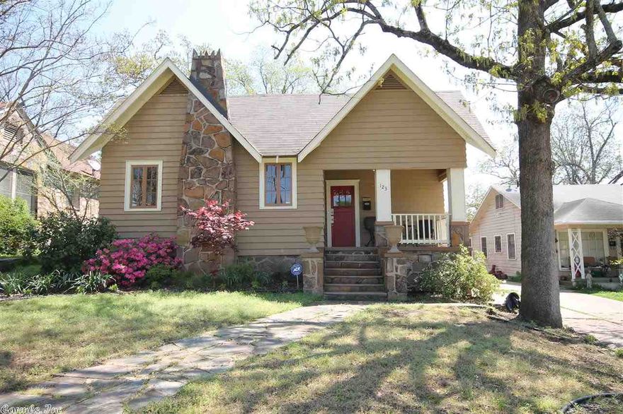 Charming cottage with great curb appeal. Spacious formal living and dining rooms with original refinished hardwood floors and true divided light windows throughout. Remodeled kitchen with travertine floors, updated cabinets, and unique pendant lighting. Remodeled bathrooms with travertine floors and new tile work in master bath.  Private backyard, fully fenced. Covered front patio.  Turn key home within walking distance from UAMS