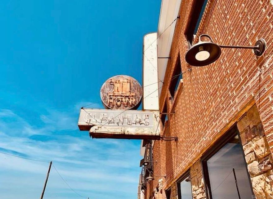 Check out this incredible investment opportunity with Downtown Jonesboro's premiere luxury lofts! Includes nine spacious 2-bedroom, 2-bath units, plus two large 1-bedroom, 1-bath units. Each one features floor-to-ceiling windows, exposed brick, tall ceilings, and an open, modern layout. Private entrances add a nice touch of privacy and safety for tenants. Inside, the units come fully equipped with all appliances, including high-end GE washers and dryers, dishwashers, microwaves, custom cabinetry, and stylish IKEA lighting. Tenants also enjoy expanded cable and internet. Convenient gated parking with 8 spots, plus plenty of street parking right out front. Two private decks with a fire pit give residents a cool spot to hang out and relax. Located just one block from the Downtown Entertainment District and super close to ASU and medical centers, it's hard to beat this location. Low maintenance costs just make it even sweeter. Schedule a tour of this great multi-family opportunity today!