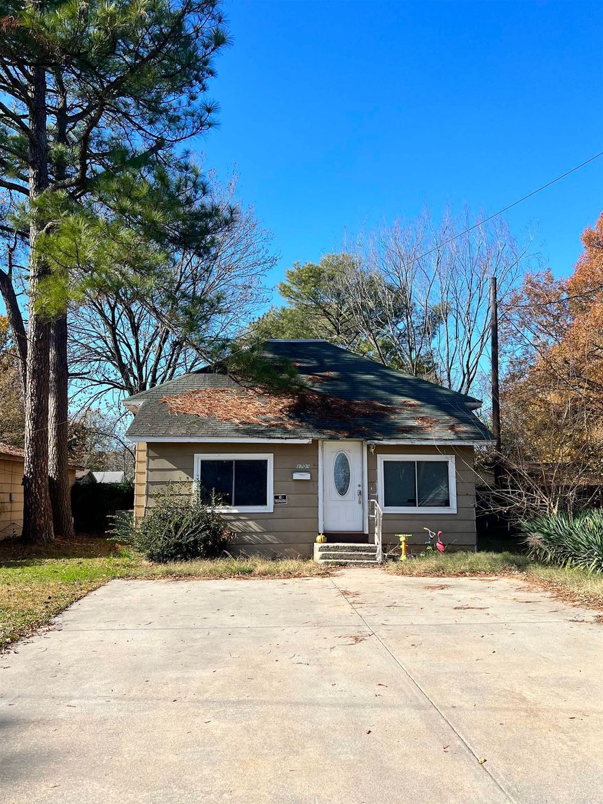 This house has plenty of living space and kitchen space. There is a separate laundry area, and an updated bathroom. There are three bedrooms, with a 4th room that could be used as an office or guest sleeping space.