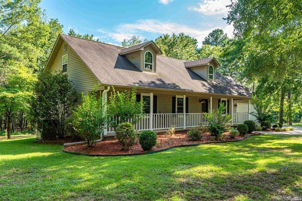 5/3 BB located 1/4 mile from Lake Hamilton School, quiet neighbor hood. Large garage, 5 th bedroom was used as an office with plenty of space ( owner worked out of it daily ), on 2 acres, large shade trees, with a couple of pear trees, garden area, storage building . Level, nice front porch and large deck on back. Great for watching the deer.