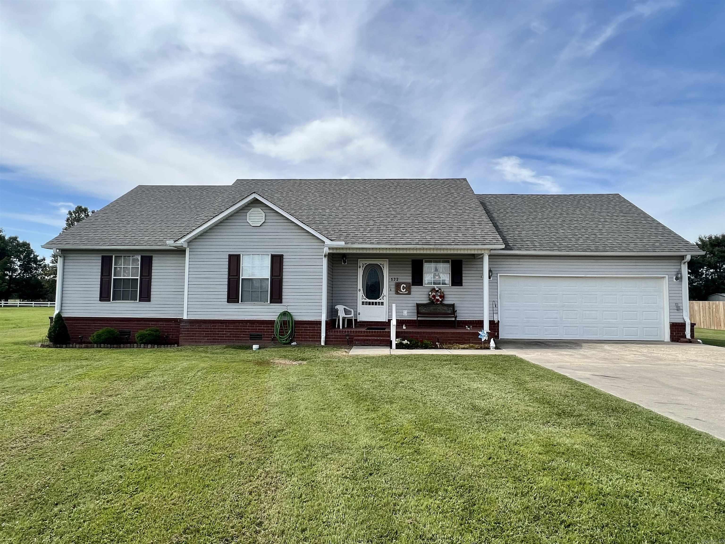 Cute and clean! This 3 bedroom, 2 bath home sits on a well manicured one acre lot. With the front porch area, the back deck, and the open dining/living areas, it would be great for entertaining! There's even a storm shelter and a storage building in the large back yard. All bedrooms are spacious, and the laundry room/mudroom is a great space to serve as a drop station after coming in from the 2 car garage. There's also a pond in the cul-de-sac just across the road! Make an appointment to see it today!