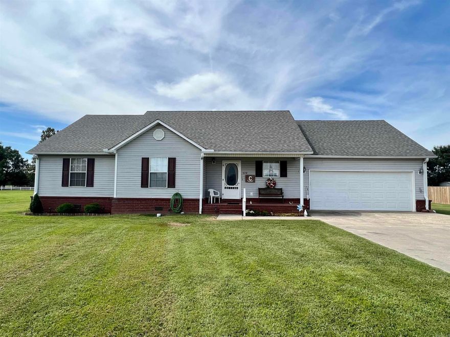 Cute and clean! This 3 bedroom, 2 bath home sits on a well manicured one acre lot. With the front porch area, the back deck, and the open dining/living areas, it would be great for entertaining! There's even a storm shelter and a storage building in the large back yard. All bedrooms are spacious, and the laundry room/mudroom is a great space to serve as a drop station after coming in from the 2 car garage. There's also a pond in the cul-de-sac just across the road! Make an appointment to see it today!