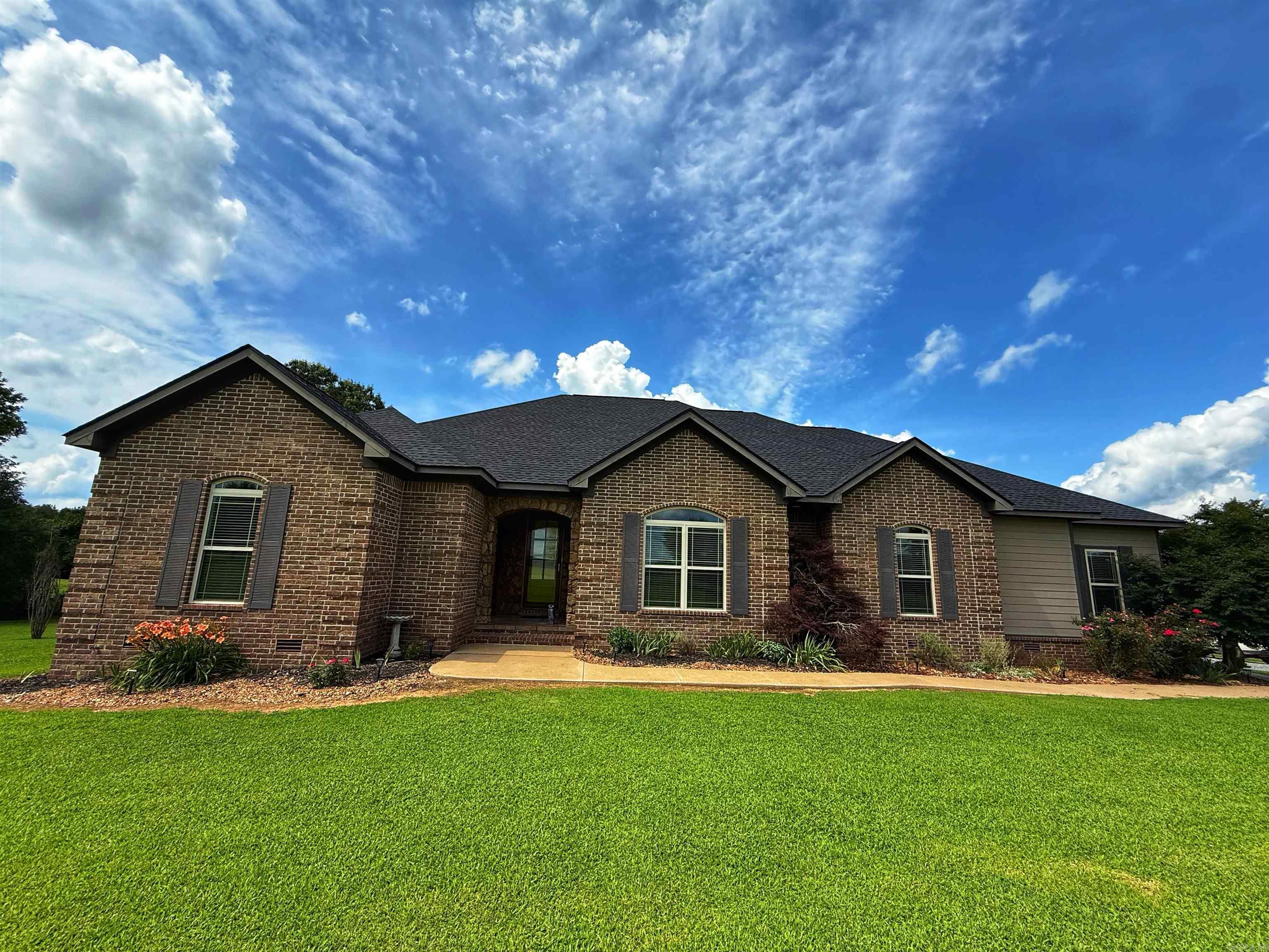 Have you been waiting on that SHOW STOPPER on a bit of acreage?! It has arrived! 70 Gates Lane packs a lot of punch! 4 bedrooms (3 with walk in closets), 3 full bathrooms, open concept, eat in kitchen, formal dining, and an incredible bonus family room! The primary en suite is INCREDIBLE and offers a stand alone tub, tiled shower, double vanities, and the closet from your dreams!!! Step out of your bedroom onto a massive, private back deck and meander down the path to your pool! Additional property perks include a spacious shop building, a storage building, and 4 acres m/l of beautiful yard! You can't go wrong with this property and it is just minutes from Batesville!
