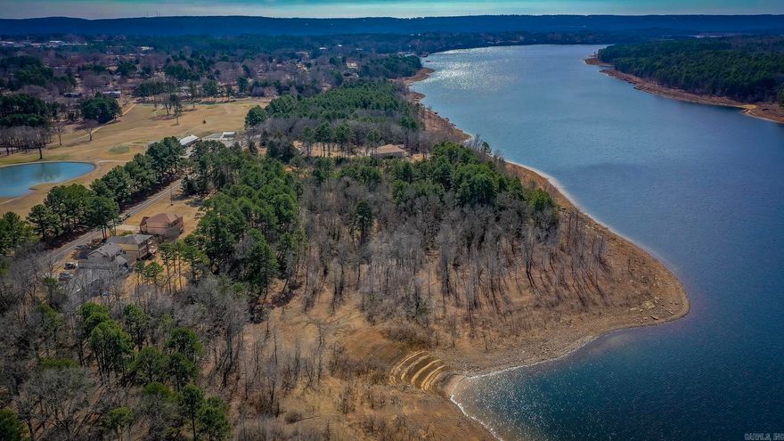 Heber Springs Lake Front Lot with Views of Greers Ferry Lake! Lot has gentle walk to the water and is located across the road from Thunderbird Country Club. Call today!