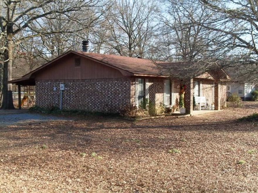 Well maintained home on corner lot, approximately 3-4 miles to shopping mall, I-40 and schools.  New shingles on roof, new storage building.  This is a great buy!!!