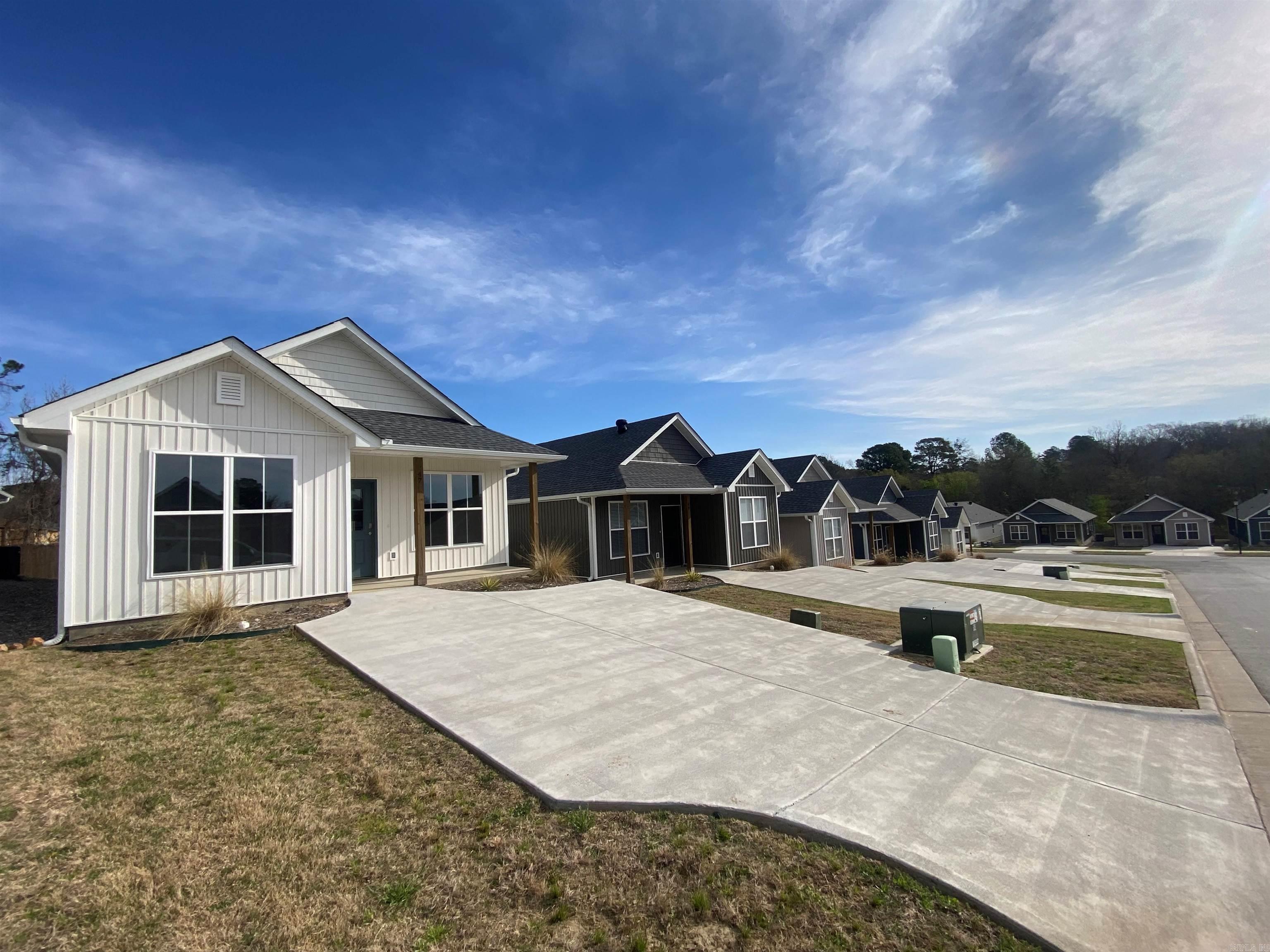 Don't miss this exceptional chance to build a lucrative rental portfolio in a thriving community! 5 homes in a row, maximizing efficiency in property management. Offered significantly below current market value, ensuring excellent ROI. Each property presents a turnkey investment with high tenant appeal. A 1-year builder's warranty included for added peace of mind! HOA handles all front and back yard maintenance, eliminating landscaping hassles. This subdivision has a proven rental market with comparable homes currently renting for $1900+ per month, demonstrating strong rental demand. Vibrant neighborhood with a dedicated pickleball court, dog park and manicured green space area. A rare opportunity to offer a āClass Aā, BRAND NEW housing option located in the heart of Little Rock, offering convenient access to shopping, dining, entertainment and major employers. Perfectly positioned between Interstates 430 and 630 making highway access effortless! Seller paying up to $10k in closing costs! *Furnished photos are of the model home in the subdivision*