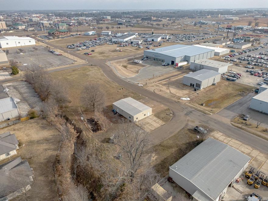 Welcome to the Market 3103 Prosperity Drive in Jonesboro, Arkansas. A Bright Opportunity for investors. 2,400 sf of Commercial zoned C-3 situated on a one acre lot. A Service Repair Garage currently used for window tinting and car detailing. Property location is a Prime area surrounded by Car dealerships, walking distance behind the Malco Jonesboro Towne Cinema and located off Parker Road (Access Road) between Caraway Rd and Red Wolve Blvd.  Interstate 555 is less than a five min drive offering strong accessibility for business operations. Call today to schedule your tour and make an investment in tomorrow.