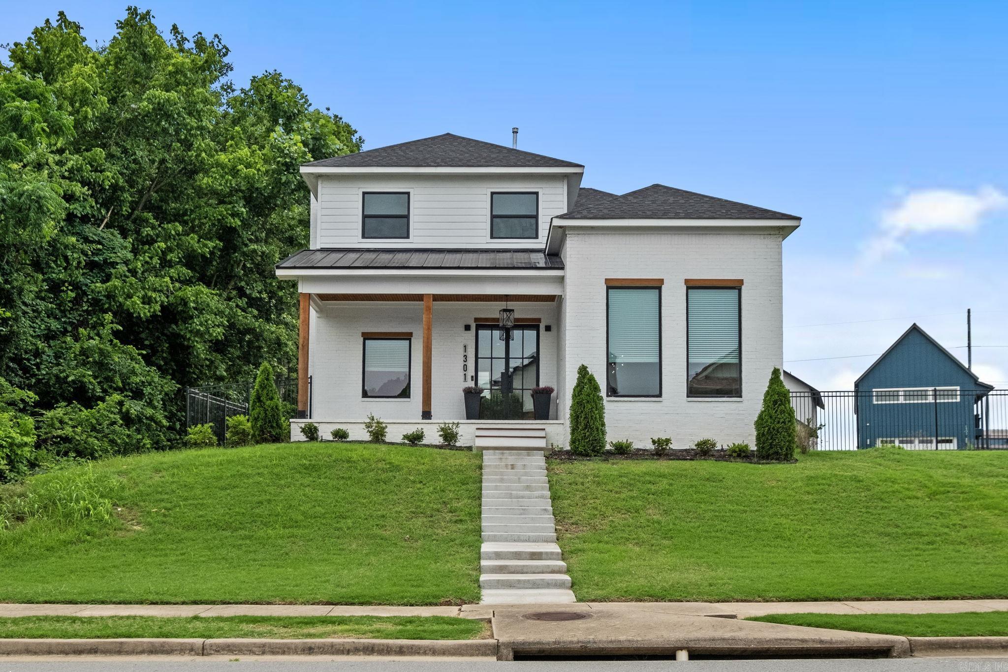 Motivated seller, bring us an offer!!! Custom built Rockwater home with 4 bedroom, 3 1/2 baths including 2 master bedrooms, one downstairs and one upstairs with a private set of stairs for a guest/in-law suite and separate game/hang out area for kids. It is the largest single lot in Rockwater Village (Riverfront gated neighborhood with access to the Arkansas River Trail and Marina) and has a back yard completely fenced in. It features a tankless gas water heater, 3 car garage with 50-amp & 30 amp outlet for EVās, all gas appliances, backlit gas fireplace, large primary bath with heated tile floor and an oversized shower where each side controls their own shower head, wall jets, &n rain shower head and every room has walk in closets. It has 2 balconies, one that over looks the river and state capital, large windows and doors throughout, 10 ft ceilings downstairs with 13ft dining room ceiling, shaker panel cabinets with soft close hardware, walk-in pantry and laundry room. It is 1 ½ miles from both downtown LR and NLR. The POA includes gated entrance, all lawn mowing, and weed treatments. Call to see it today!