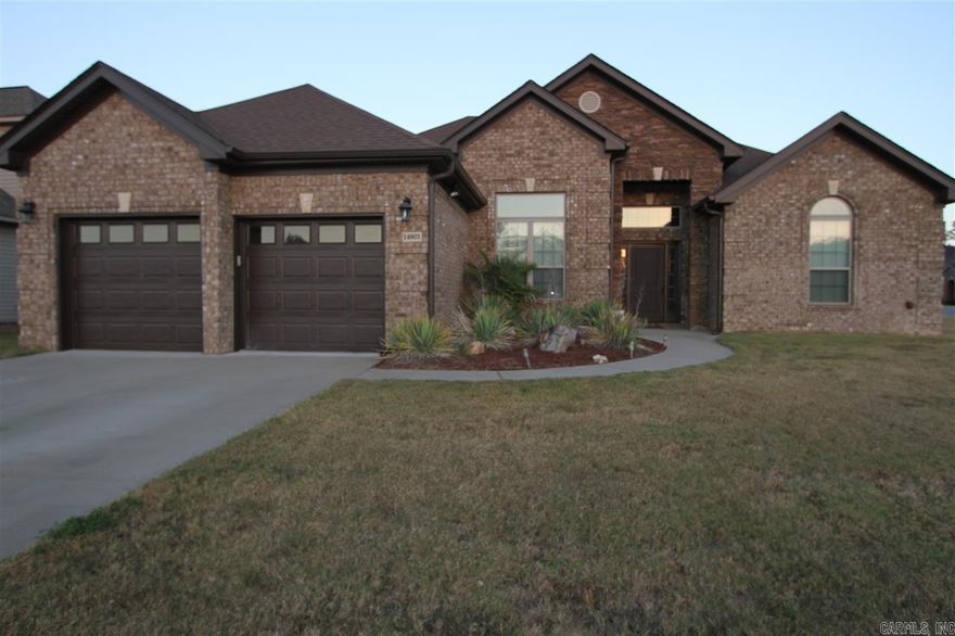 Truly gorgeous. Tall (vaulted & tray) ceilings, hardwood floors, formal dining room, solid granite countertops in kitchen and baths. New fixtures. New 5 Gas-Burning Stove. All stainless steel appliances stay. Huge cabinetry. Master suite fireplace by Jacuzzi tub. Huge closet & bath. Walk-in seated shower with travertine tile. Energy efficient. New Bose surround-sound system.  New DWMobile VMax motion sensing security system w/ 4 cameras. Gorgeous window treatments.  Corner lot. Low price! This is the one.