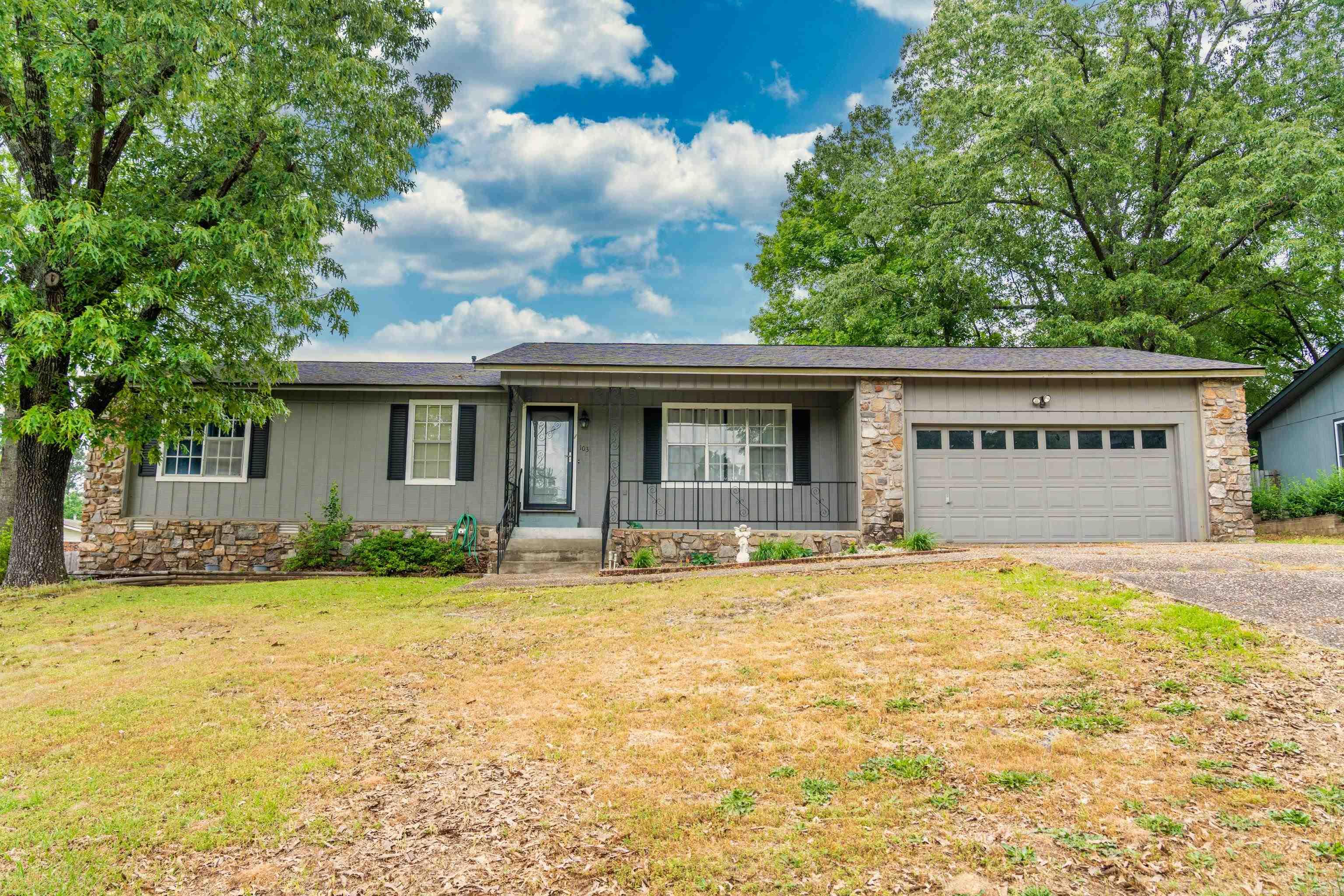 Well-maintained, one-owner home situated on a spacious 0.35-acre lot with an additional buildable corner lot included! This 3-bedroom, 2-bath home offers a traditional layout with both a formal living room and a separate den featuring a cozy wood-burning fireplace—perfect for relaxing or entertaining. There is also a dining area right off the kitchen that is equipped with a new gas stove, a dishwasher, garbage disposal, and plenty of cabinet space. Enjoy the outdoors from the inviting front porch or entertain guests on the back patio overlooking the large, fenced backyard—ideal for pets, play, or future additions. Additional features include: 2-car garage, Mature trees, a spacious lot offering flexibility and privacy, one-owner history, showing pride of ownership. Located in Lakeside School District, this property combines charm, space, and future potential. Great opportunity for homeowners or investors alike!