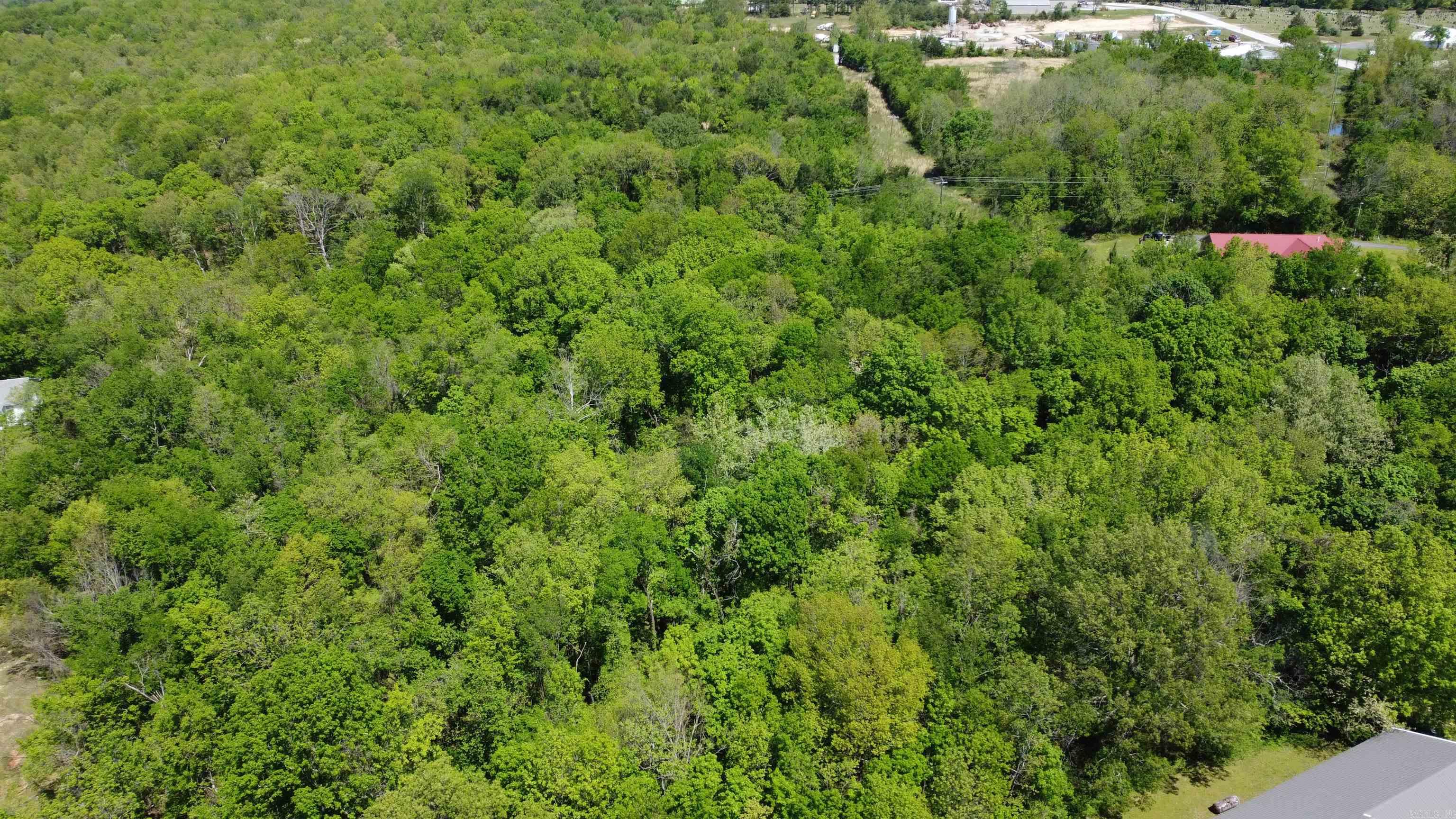 12± Wooded Acres in the Heart of the Ozarks ā Marshall, AR Discover the perfect blend of seclusion and convenience with this rare 12± acre wooded property located within the city limits of Marshall, Arkansas. Tucked away in a peaceful natural setting, this land offers privacy while still being just minutes from local amenities, shops, and dining. This is an ideal location for a private retreat, vacation getaway, or forever home. Wildlife is abundant, and the sounds of nature create a serene backdrop. The land features natural rock formations, ample space for gardening, and electric service is available at the property. Enjoy a nostalgic evening at one of the few remaining drive-in movie theatersāthe beloved Kenda Drive-Inājust minutes away. Outdoor enthusiasts will appreciate being less than 15 minutes from the Buffalo National River, offering kayaking, canoeing, fishing, hiking, and numerous recreational activities. Looking for more entertainment? You're just an hour and a half from Branson, Missouri, known for its live shows, attractions, and shopping. Donāt miss your chance to own your own piece of the Ozarksāa truly special property with endless possibilities.