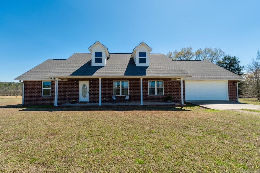 Welcome home to this charming 3 bedroom, 2 bathroom brick home nestled in the desirable Woodland area of Clarksville! Sitting on approximately 2 beautiful acres, this property offers the perfect blend of peaceful country living with the convenience of town just minutes away. Step inside to find comfortable living spaces filled with natural light and a layout designed for everyday living. Whether you’re hosting family gatherings or enjoying a quiet night at home, this home offers a cozy and welcoming atmosphere throughout.  Outside, you’ll love the extra space and privacy the 2 acres provide. There’s plenty of room to enjoy the outdoors, start a garden, add a shop, or simply relax and take in the scenic surroundings.