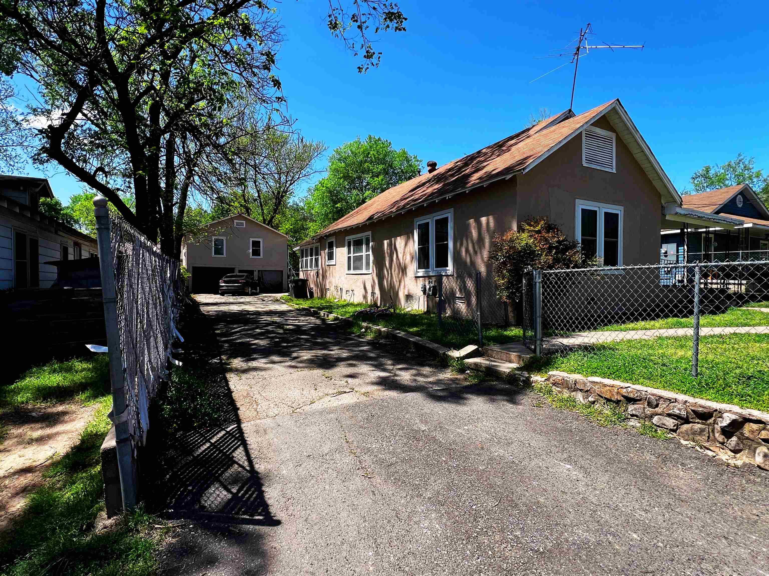 Investor / House Hack Special! This income producing property has been recently updated and is currently collecting rents of $1550 in main house 3/2 and $775 in the studio around back each month. The owner pays for water and electric. Showings require proof of funds or pre-qualified letter.