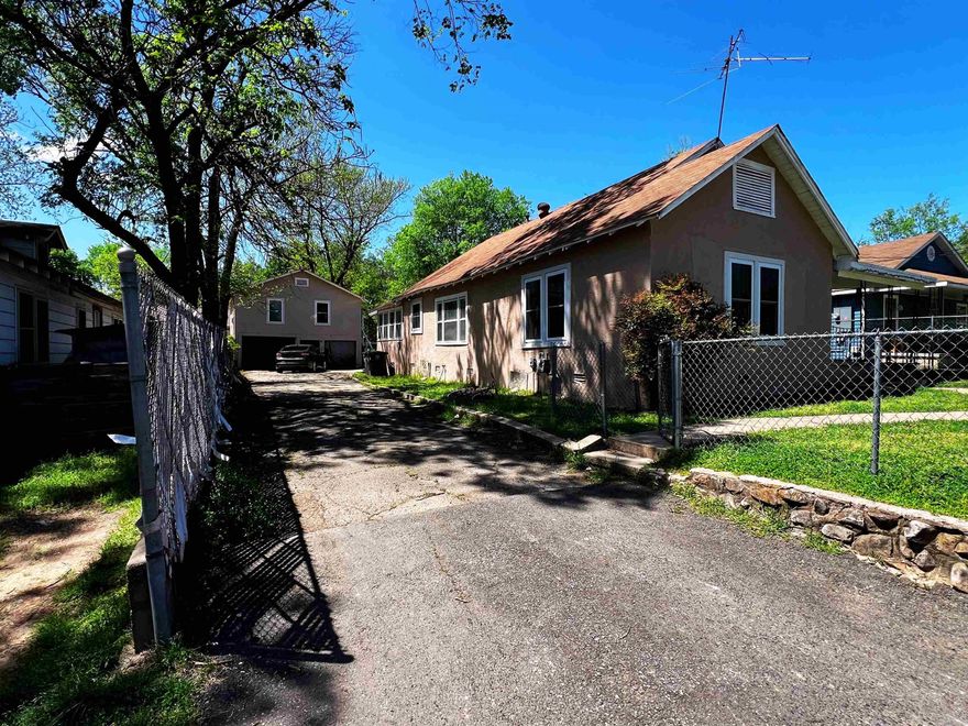 Investor / House Hack Special! This income producing property has been recently updated and  is currently collecting rents of $1550 in main house 3/2 and $775 in the studio around back each month. The owner pays for water and electric. Showings require proof of funds or pre-qualified letter.
