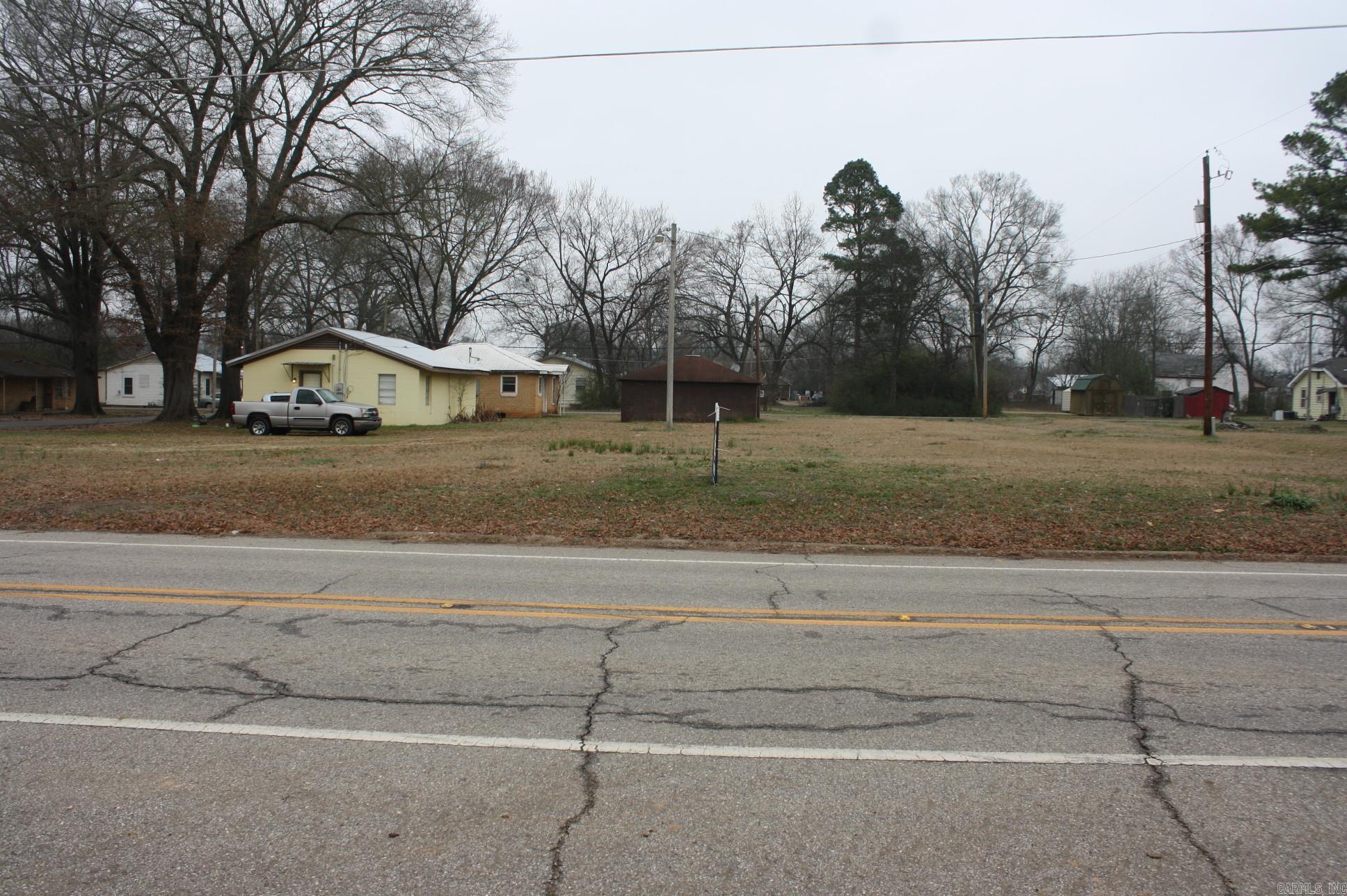 GREAT INVESTMENT OPPORTUNITY ENTIRE CITY BLOCK including 4 structures (IN NEED OF TLC)